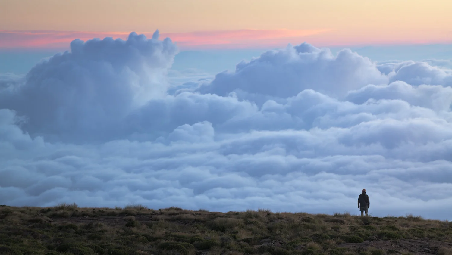 Nikon D850 / 70-200 f4 lens @ 200mm / ISO 100 - f/11 - 1/4 sec. Matt was kind enough to run over to the edge of the escarpment to allow us to take a portrait of him with an incredible inversion below us, just before the sun had risen. I love the colour contrast between sky and cloud. Thanks Matt!