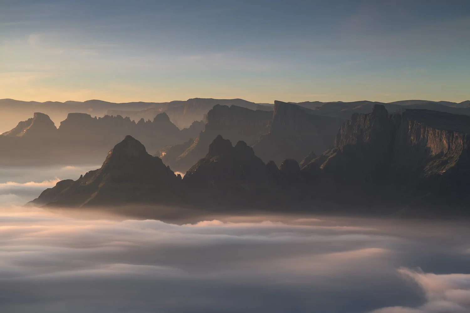 Nikon D850 / 70-200 f4 lens @ 145mm / ISO 64 - f/8 - 1/30 sec. The morning continued to produce amazing conditions and after the sun had risen, I captured this image as the first rays of light hit the inversion below.