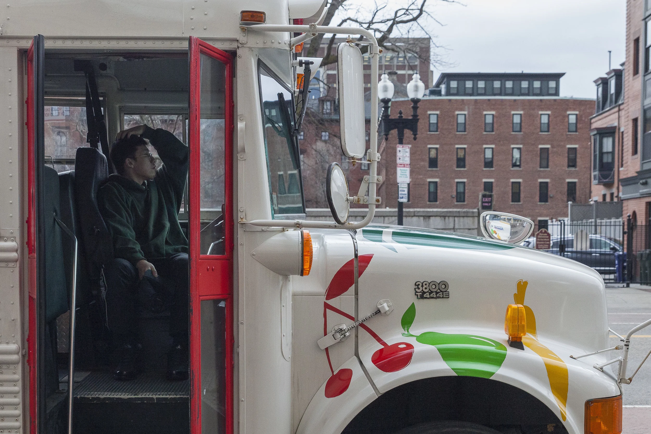 A Fresh Truck Volunteer finishes up a day at the market outside the South End Health Center.