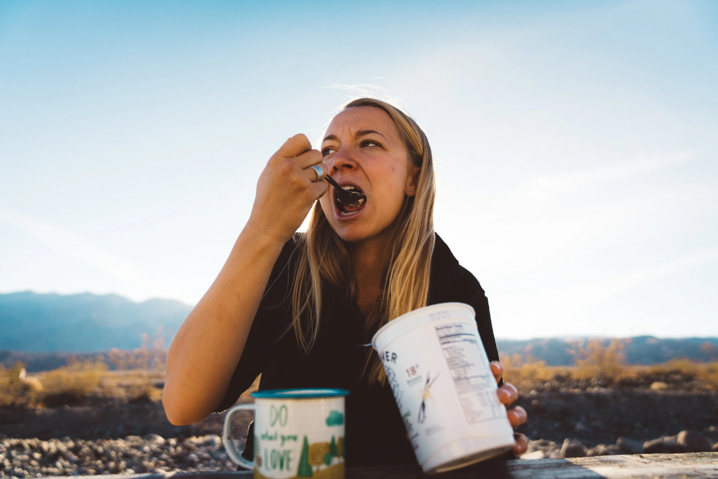 Danielle enjoying granola and yogurt for breakfast at Emigrant Campground.
