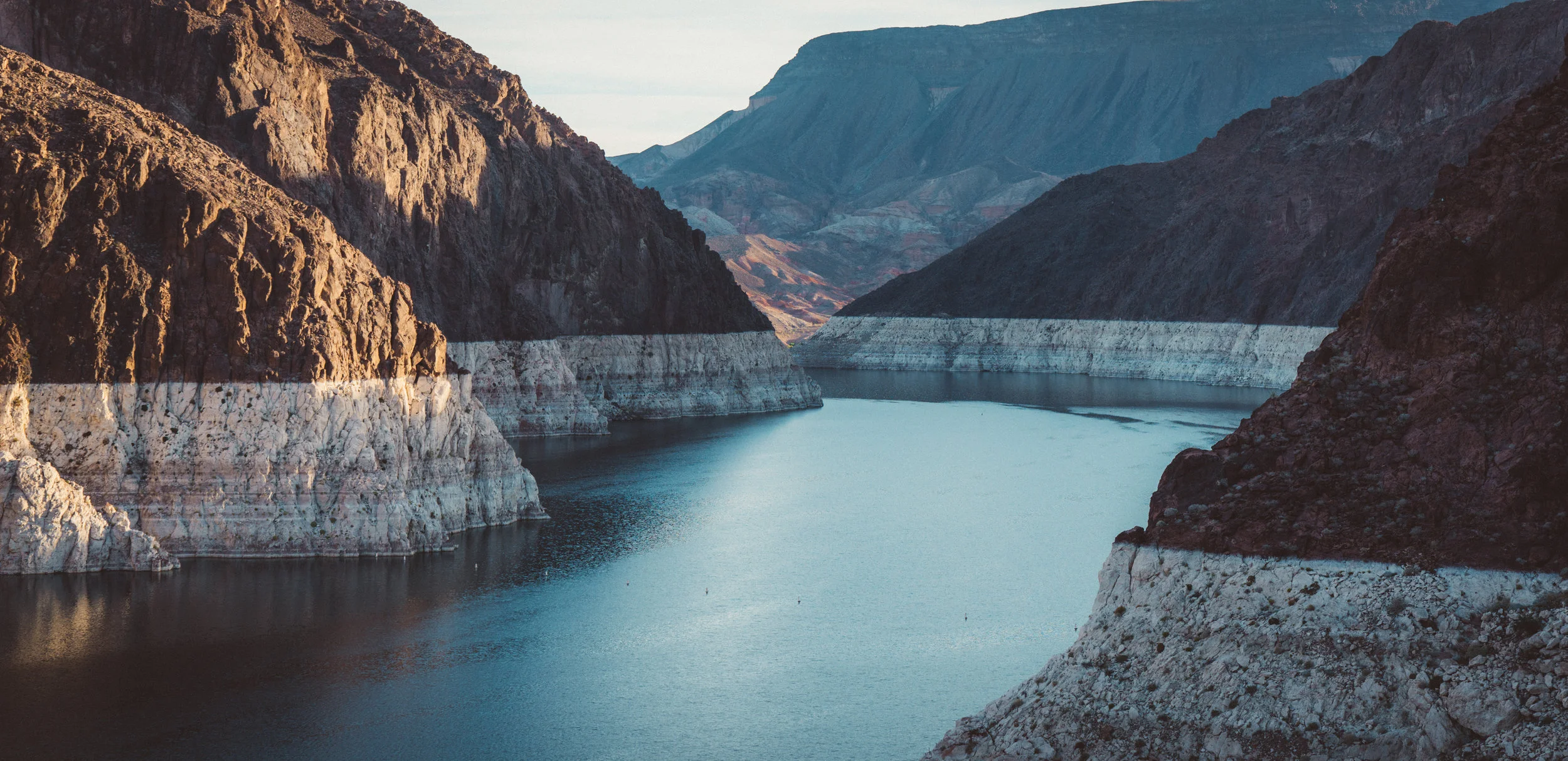 The Colorado River. The white rock has been bleached due to past rises in water level.
