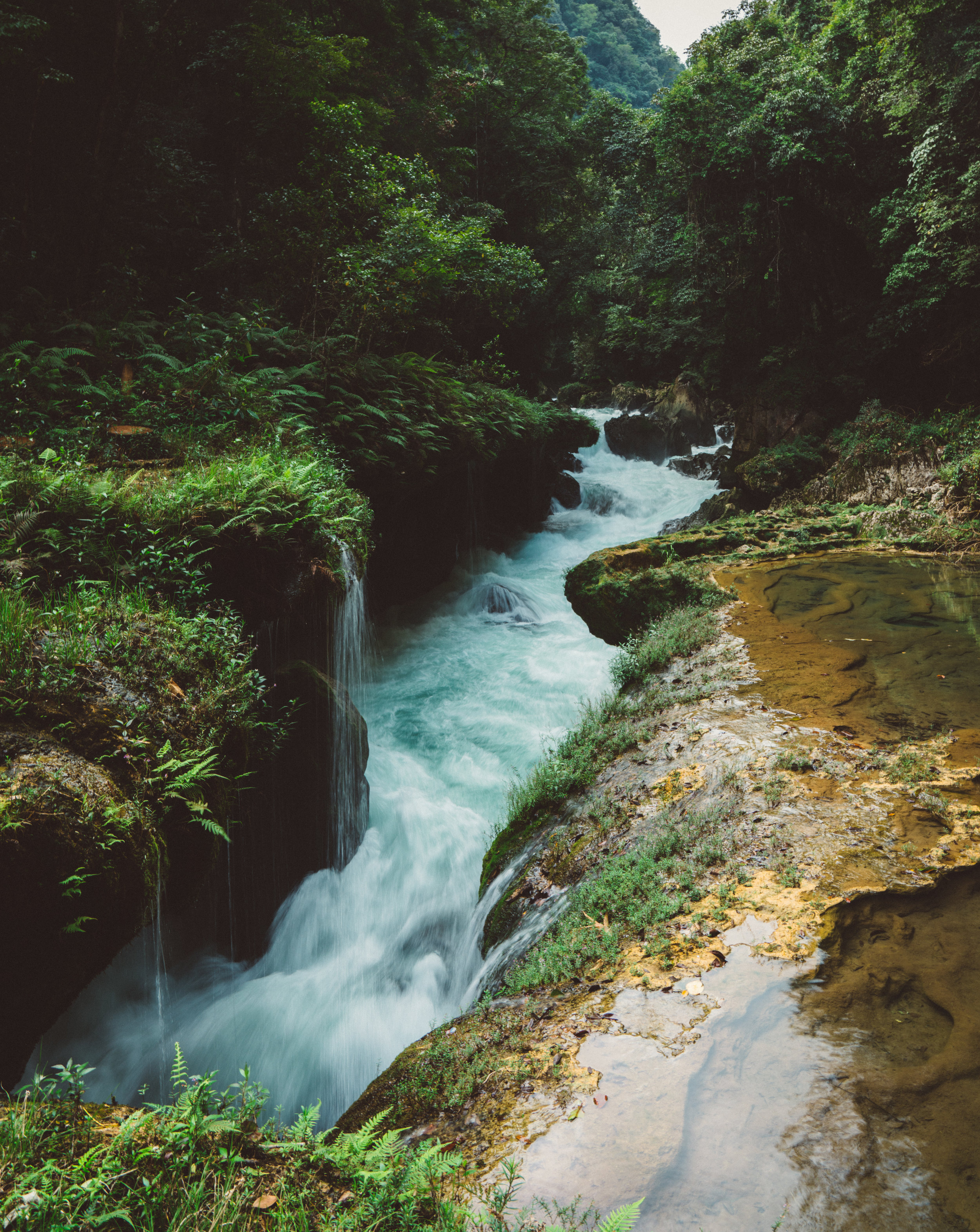 Where the river flows under the limestone 'bridge'.