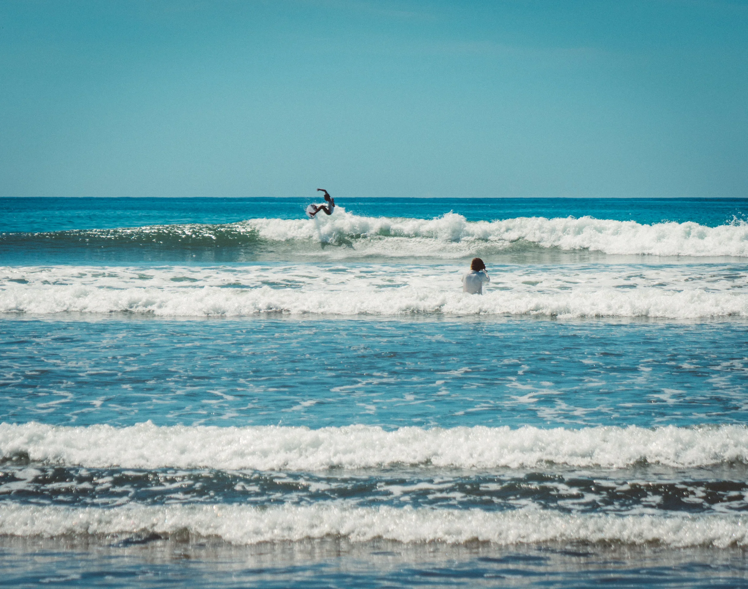 Some professional surfers competing in Dominical.