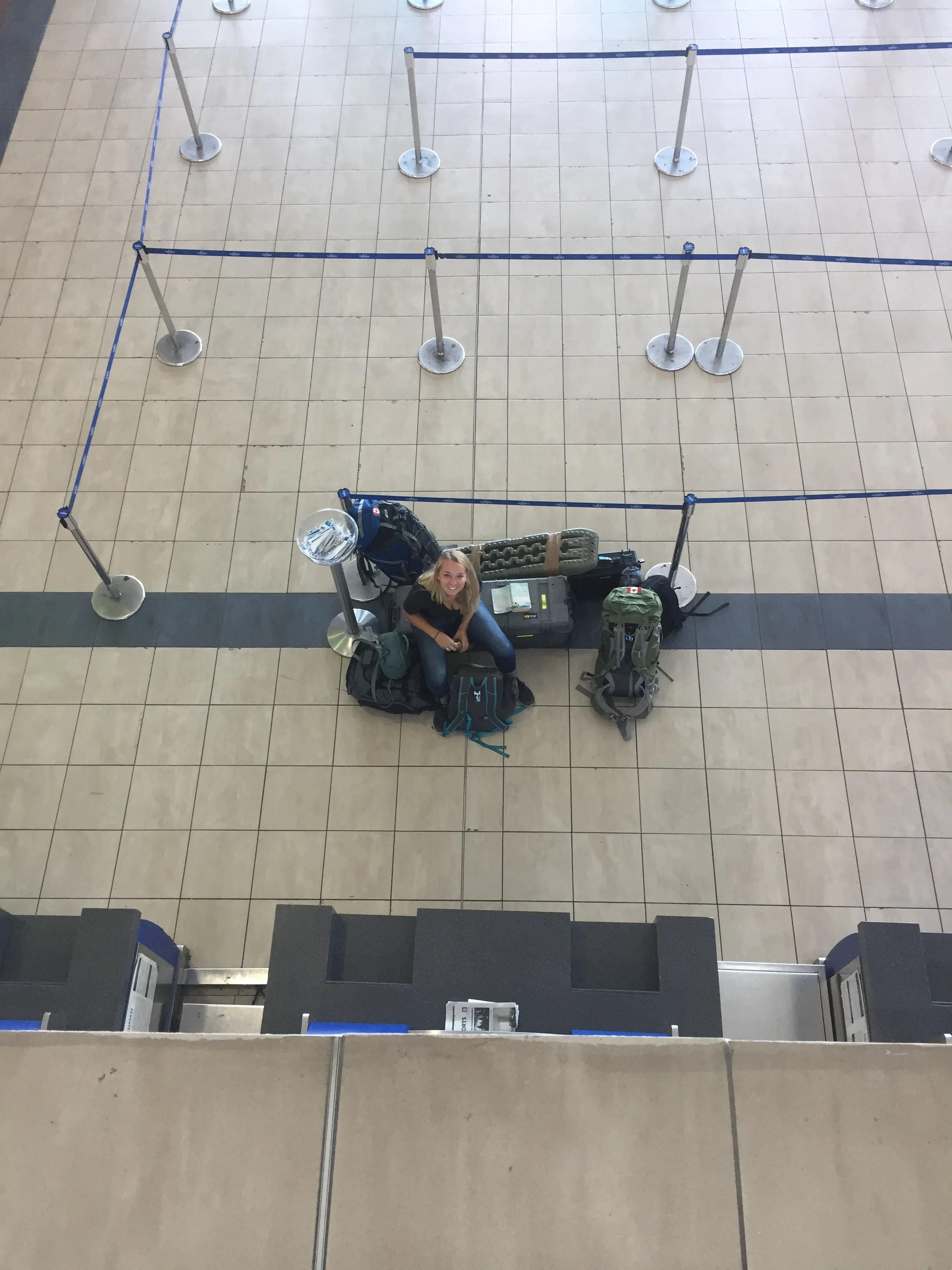 Danielle with all of our baggage waiting to check in to our flight out of Tocumen International.