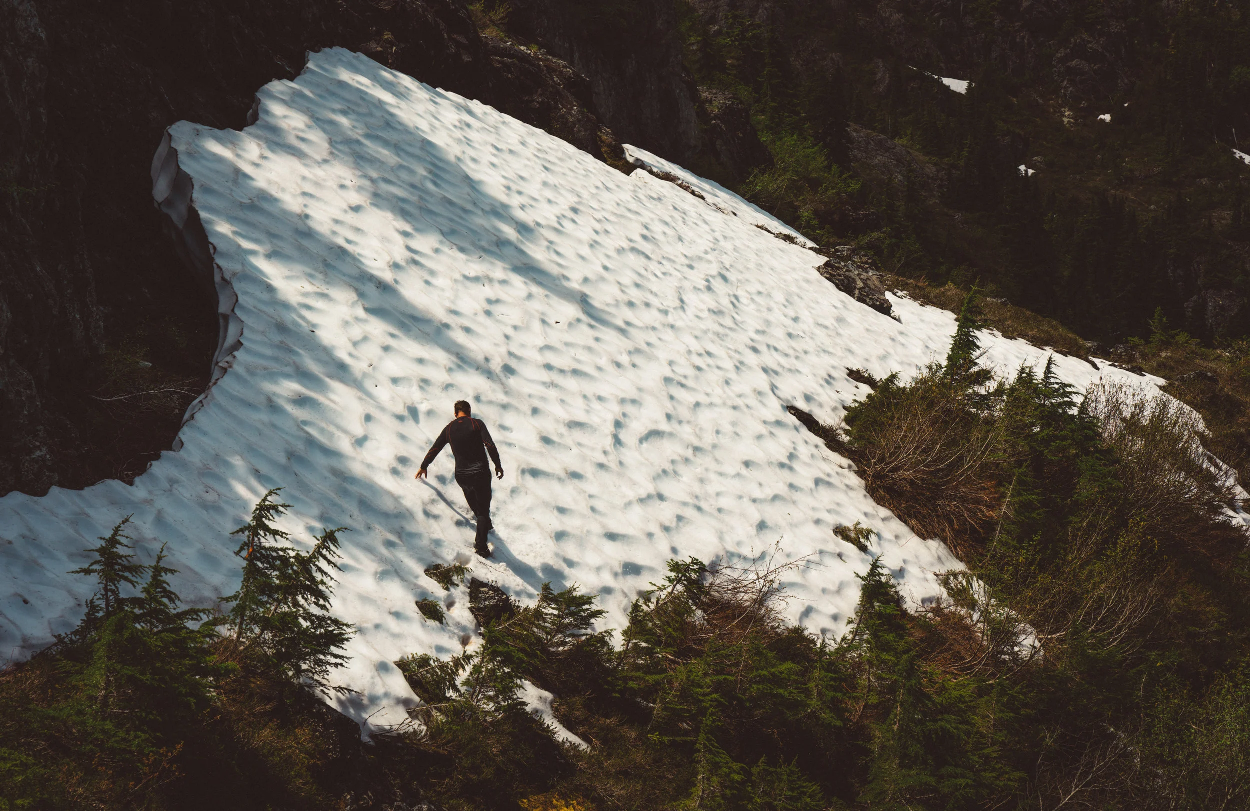 After breaking at the saddle for a bit, we then walked across this snowpack and up Landale.