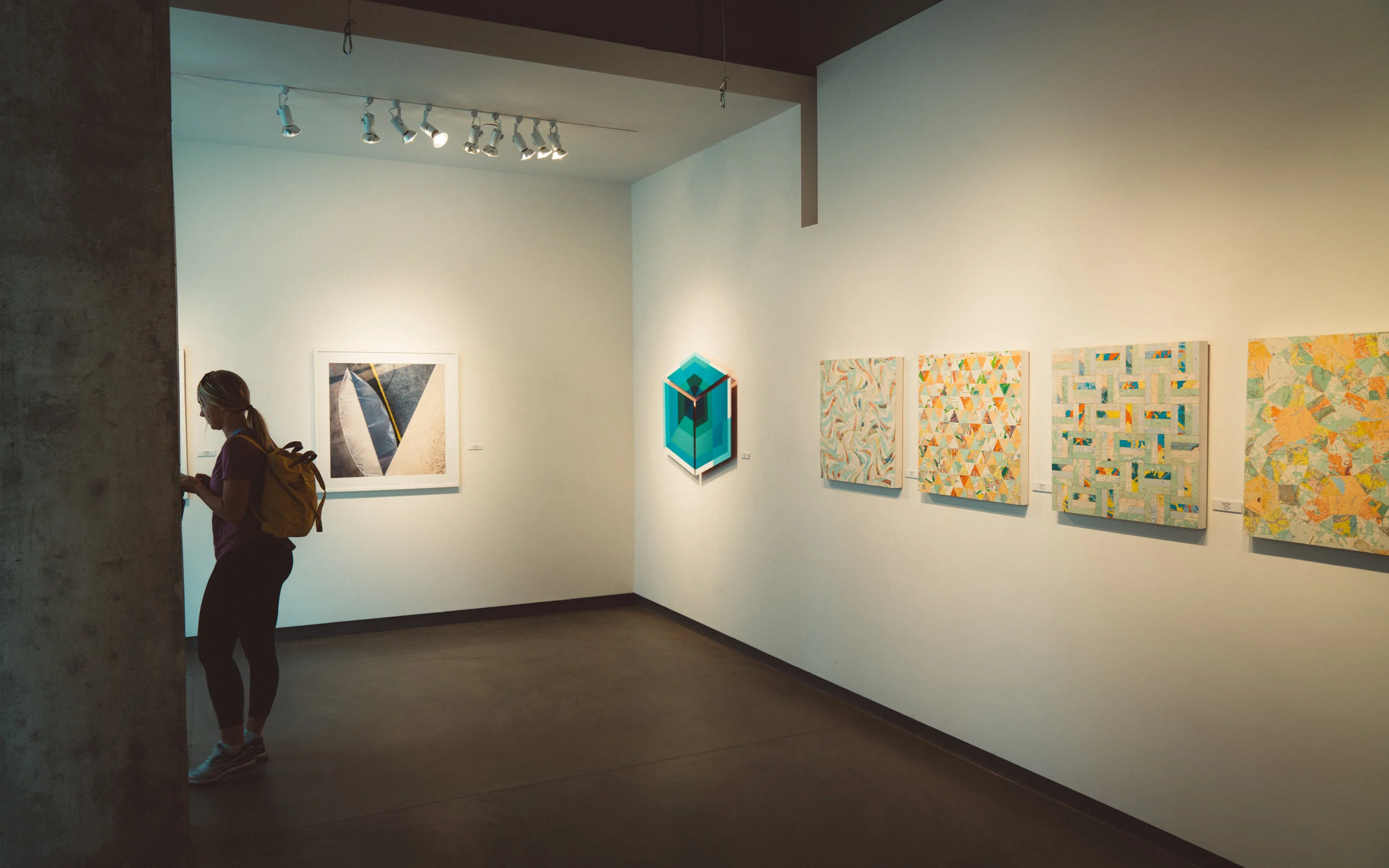 David's photography is seen on the left, with Trissy's works on the right.