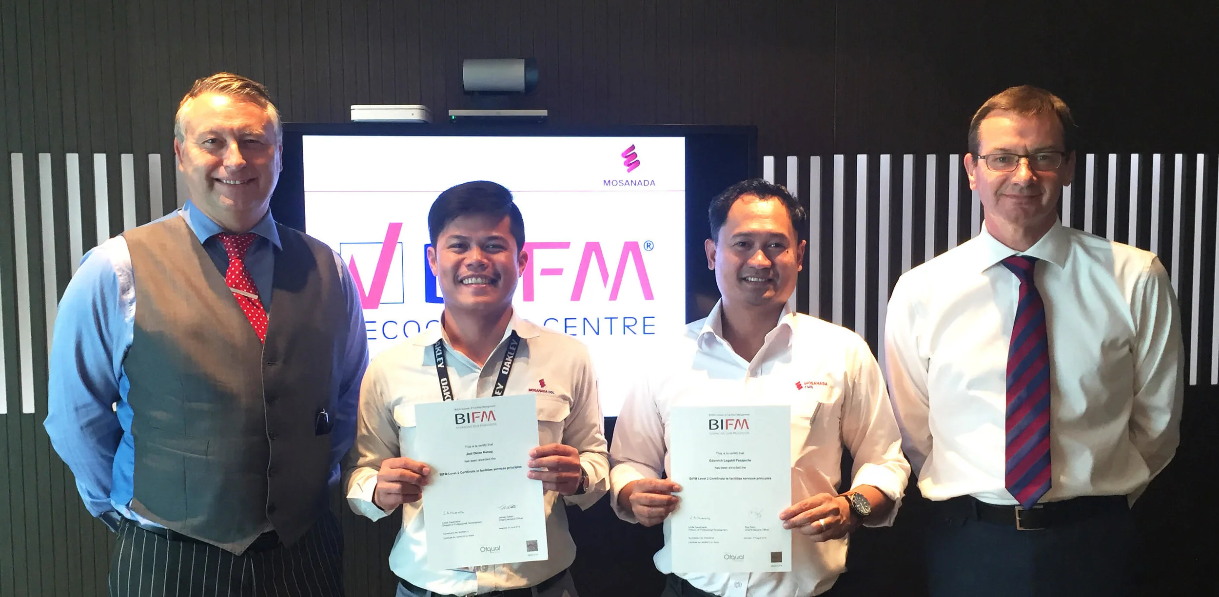 From Left: Julian Burton, BIFM assessor with BIFM Graduates Joel Nunag, and Edanrich Pasaporte, and Martin Campbell Director of Business Solutions.