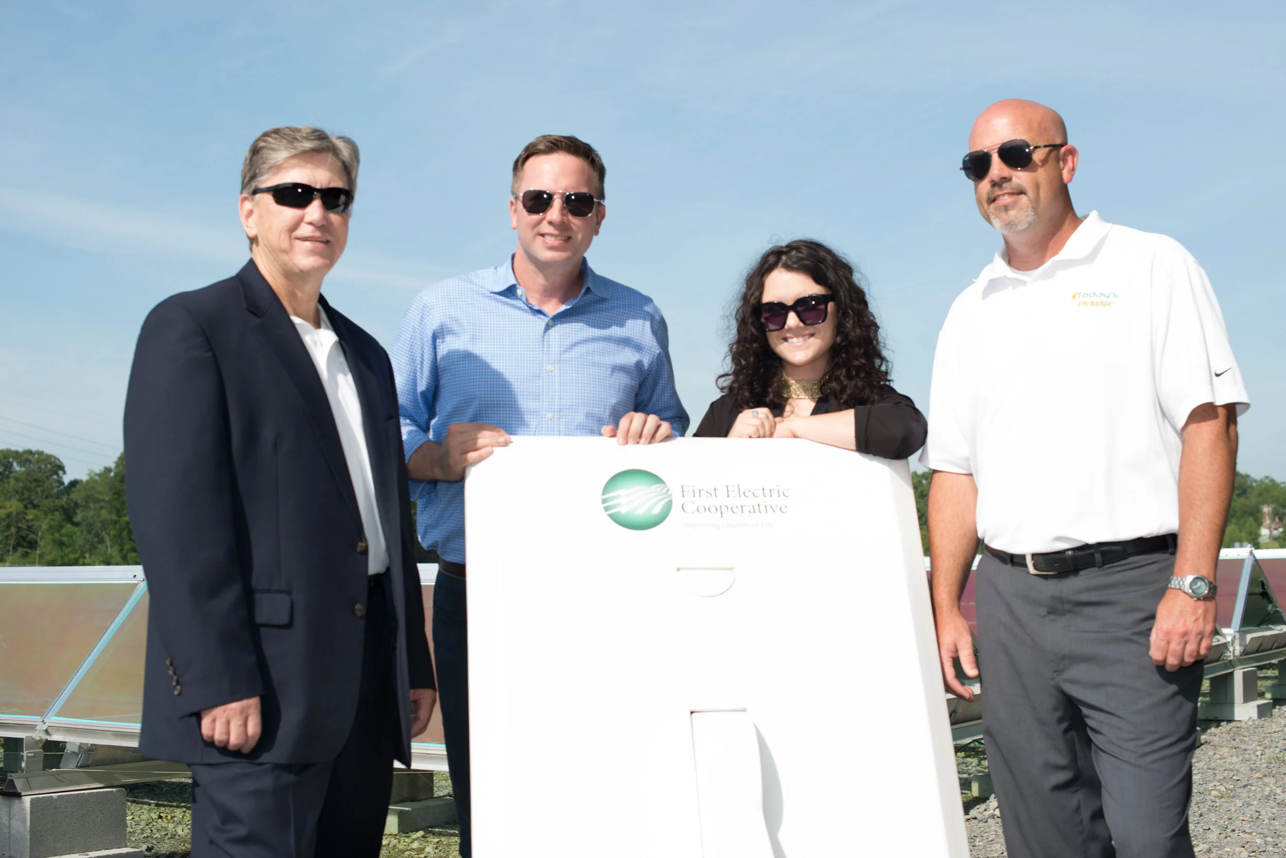 Representatives from the Today's Power team at the dedication for First Electric's 1 MW Solar Field. (Left to Right: Michael Henderson, Chris Burnley, Jennah Denney and Matt Irving. 