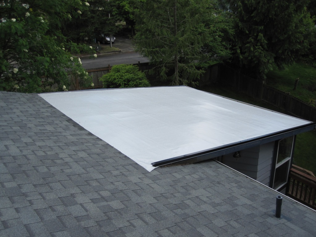 Grey-PVC-flat-roof-with-Owens-Corning-Oakridge.jpg