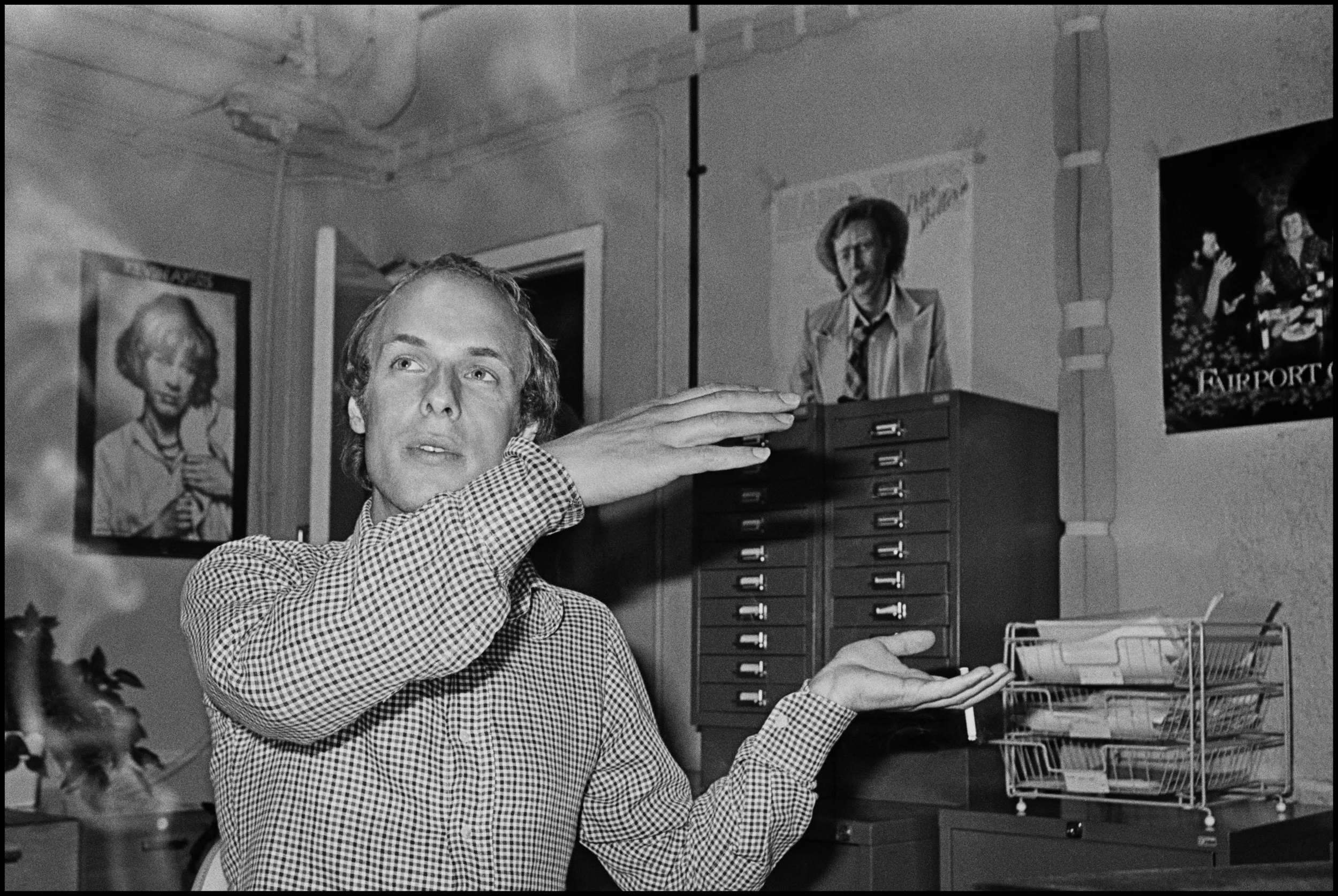 Brian Eno - Virgin Records 1978 The Clash - NME Cover 1976 The NME put the Clash on the cover for the first time in April 1977. I wanted to make sure it was something special, a photo people would remember. The Clash has their clothes made by Sebastian Conran, he had a sewing machine set up in a room next to Bernie Rhodes office at Rehearsal Rehearsals in Camden. Bernie felt the clothes were an important part of the Clash's image and they always had group shots done full length for maximum effect. But that fact bothered me, and it made me want to do something else, to shoot their heads, close up, and put that on the cover instead. I negotiated carefully with Bernie for this, placating him with lots of full length pictures shot outside first, and then I shot this photo against a white wall in his office. It was the first photo I had ever shot against white, it was what I had always wanted to do, ever since I saw the inside sleeve of Meddle back in 1971, it allowed you to isolate the subject against white, makes for nice and clean cover too. I had bought an inflatable soft box that attached to my flash gun, Tony Parsons held it above my head while I shot the variations. Yes, variations, the Clash were democratic, right, so I did a version with each band member facing the camera. This kept everyone happy although I knew all along it would look best with Paul in the centre, he was the handsome one, in fact I only showed the paper that version. All three variations were done on fourteen frames of film, mainly because the flash took so long to recharge, also because film was expensive. The result is one of my best covers, and the first one on white.