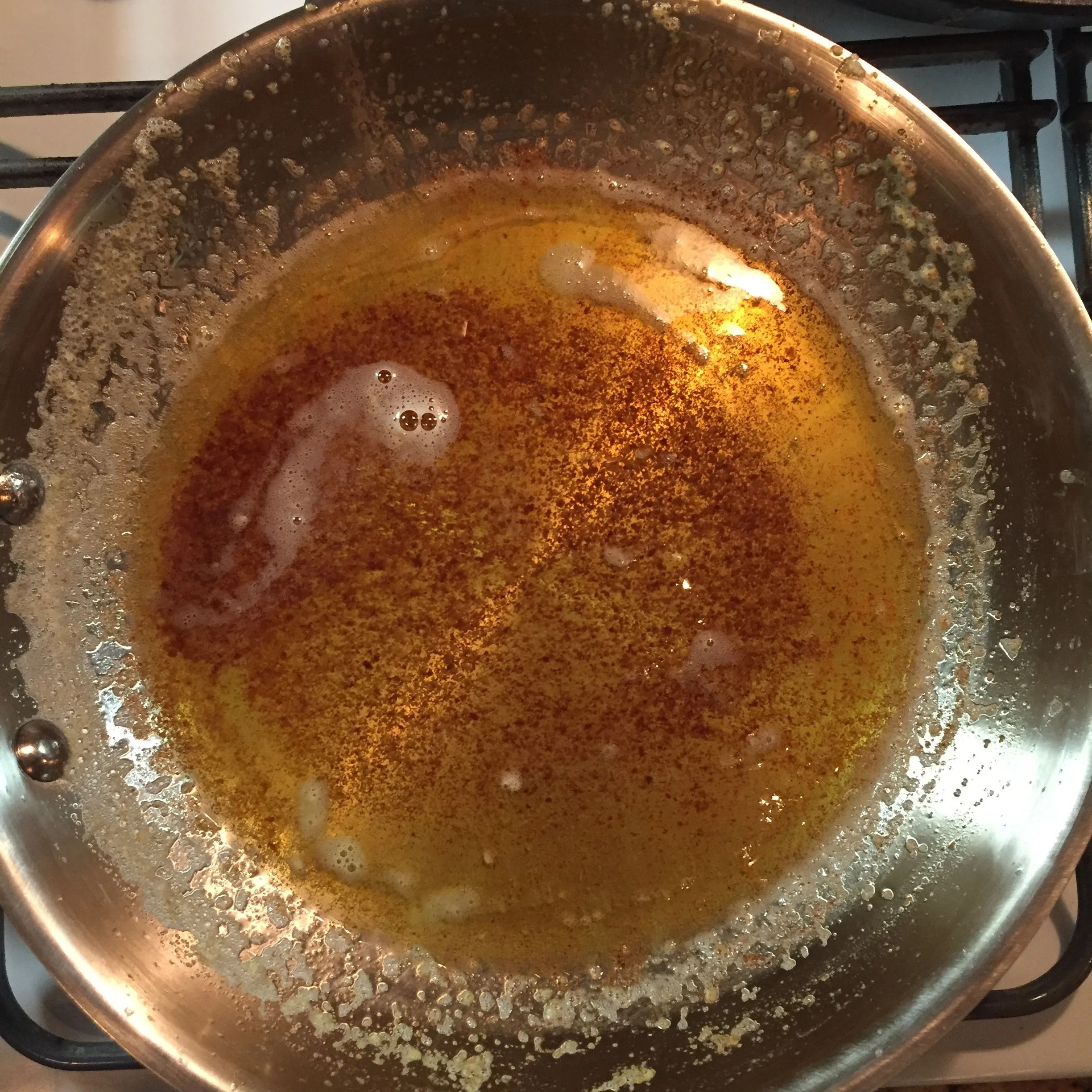 You can see the rust-colored solids and how clear the liquid gets. I forgot to take a picture when it just finished--this was after I strained about half. 