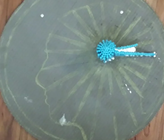 This is how it started, a 24" round wedi-board with the traced image of the logo. The conception was to elevate the Morretti rods 4" from the surface of the board to a pinacle at the epicenter of the brain.