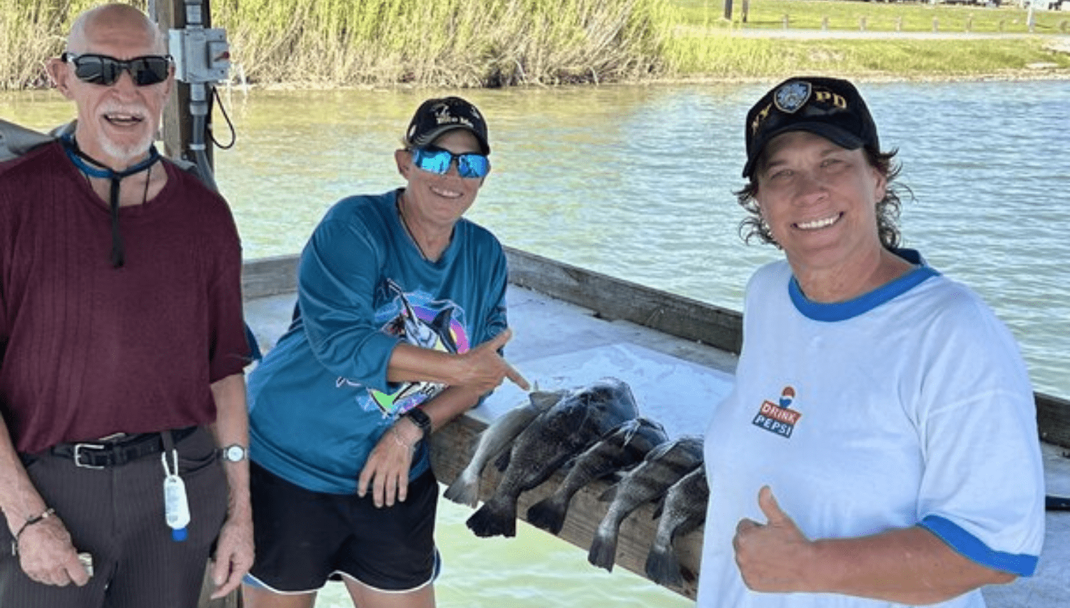 Carol Sedlacek's three-person group beside their Rockport dockside catch.