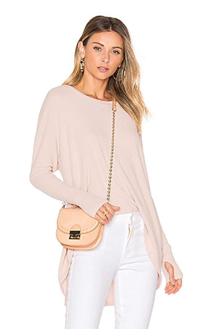 White pants, asymmetrical hem, thumb holes, back detail & go! Love this Michael Lauren Pullover
