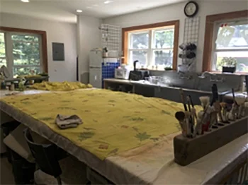 One curtain panel on my painting table in the studio.