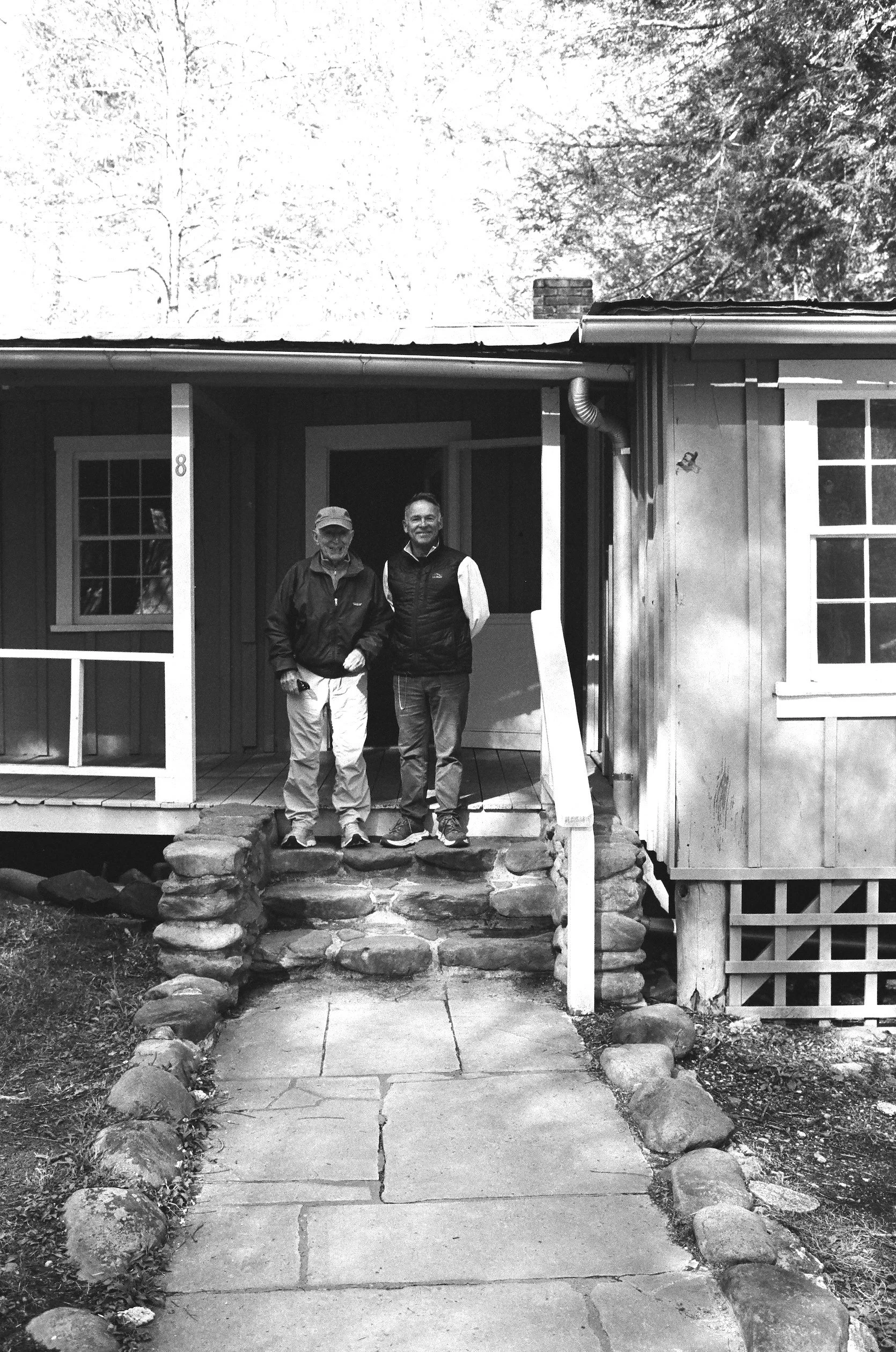 The photographer (right) and his father (left) revisiting Elkmont in 2025. The photographer’s father served a photo assistant during the Elkmont Cabins and Wonderland Hotel HABS documentation.