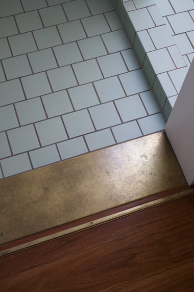 Transitional flooring via vokesandpeters.com