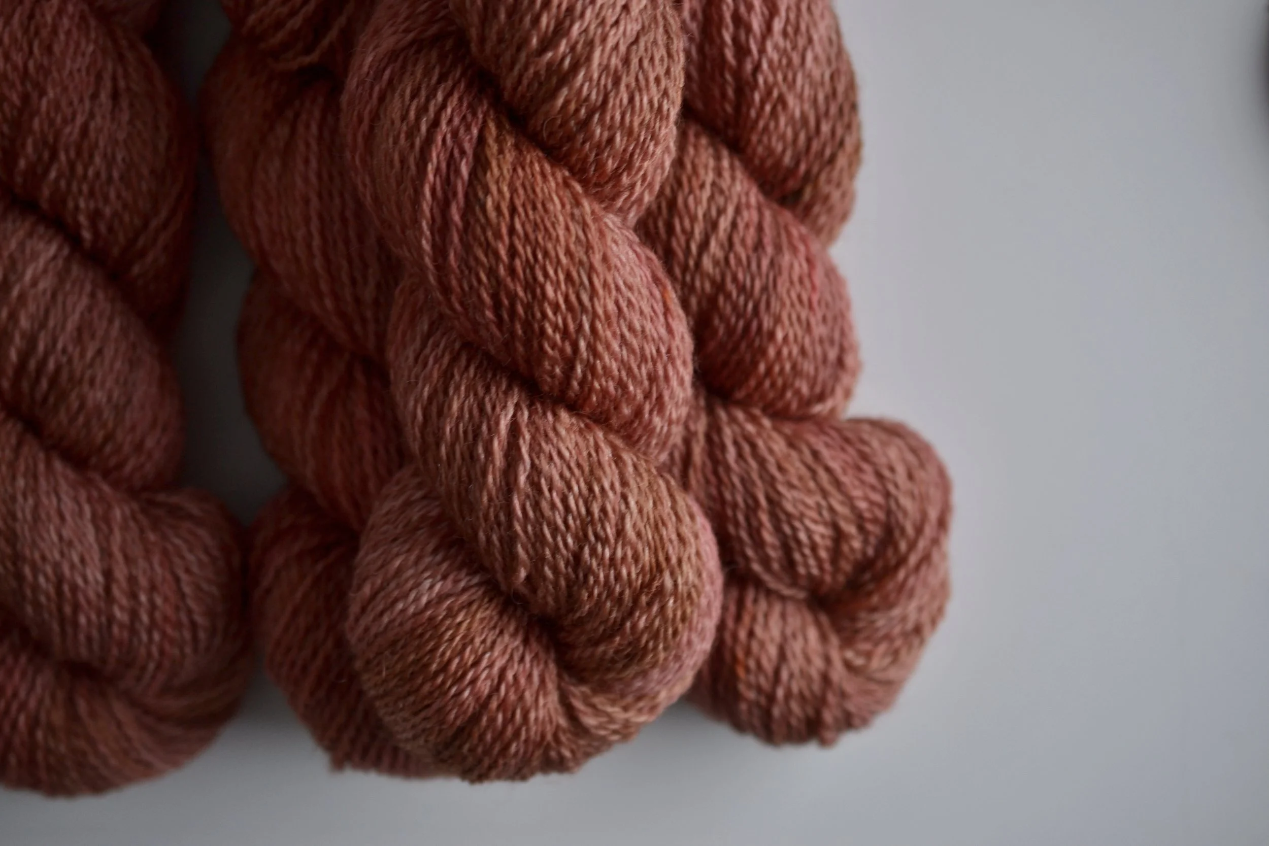 it's Down to the Wire again, on Mooresburg DK. This time, it came out with brilliant streaks of coral pink in there...obviously I cannot stop staring at it.
