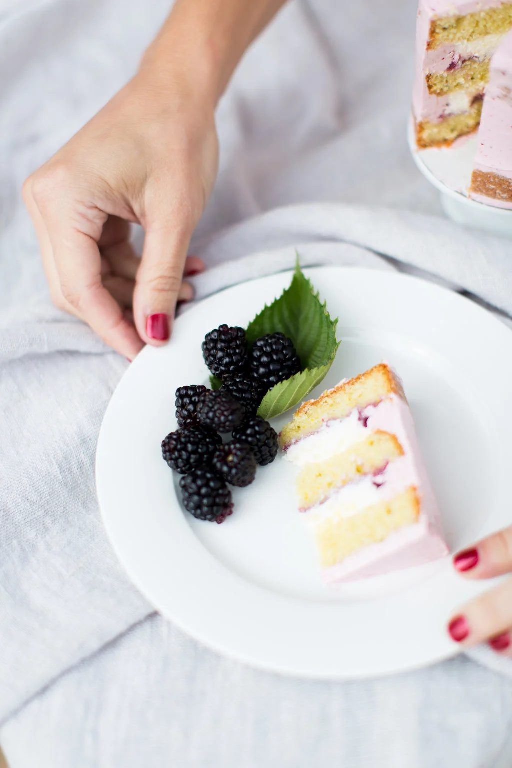 WILDBLACKBERRY CURD 2 c. wild blackberries (~1/2 C-3/4 C juice) 3 eggs yolks 4 tablespoons unsalted butter, cubed ¼ C sugar 2 TB lemon juice Bring blackberries, ¼ cup sugar and ¼ cup water to a simmer over medium; reduce to low heat and cook 10 minutes. Remove from heat and let cool 30 minutes. Once cool, puree blackberries in a food processor and strain in a fine-meshed sieve, to make about ½-3/4 cups juice. Put egg yolks, zest and lemon juice in a saucepan, add berry juice and stir well. Cook over low heat, stirring constantly, until mixture thickens enough to coat the back of a spoon. Once thickened, remove from heat and strain curd through a fine-meshed sieve, pushing through with a spoon. Whisk butter into warm curd until completely melted and combined. Cover top of curd tightly with plastic wrap to prevent a film from forming on top of curd and let cool completely before chilling in refrigerator. Store in fridge for up to a week or freeze up to 3 months. For Blackberry Buttercream, using a whisk attachment, add two tablespoons blackberry curd for every 2 cups of your favorite buttercream recipe and mix on medium speed until combined. To eliminate air bubbles, switch to a paddle attachment and mix for 2 minutes on medium speed.