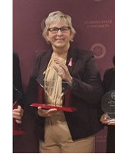 Photograph of Sue Ebbers receiving award