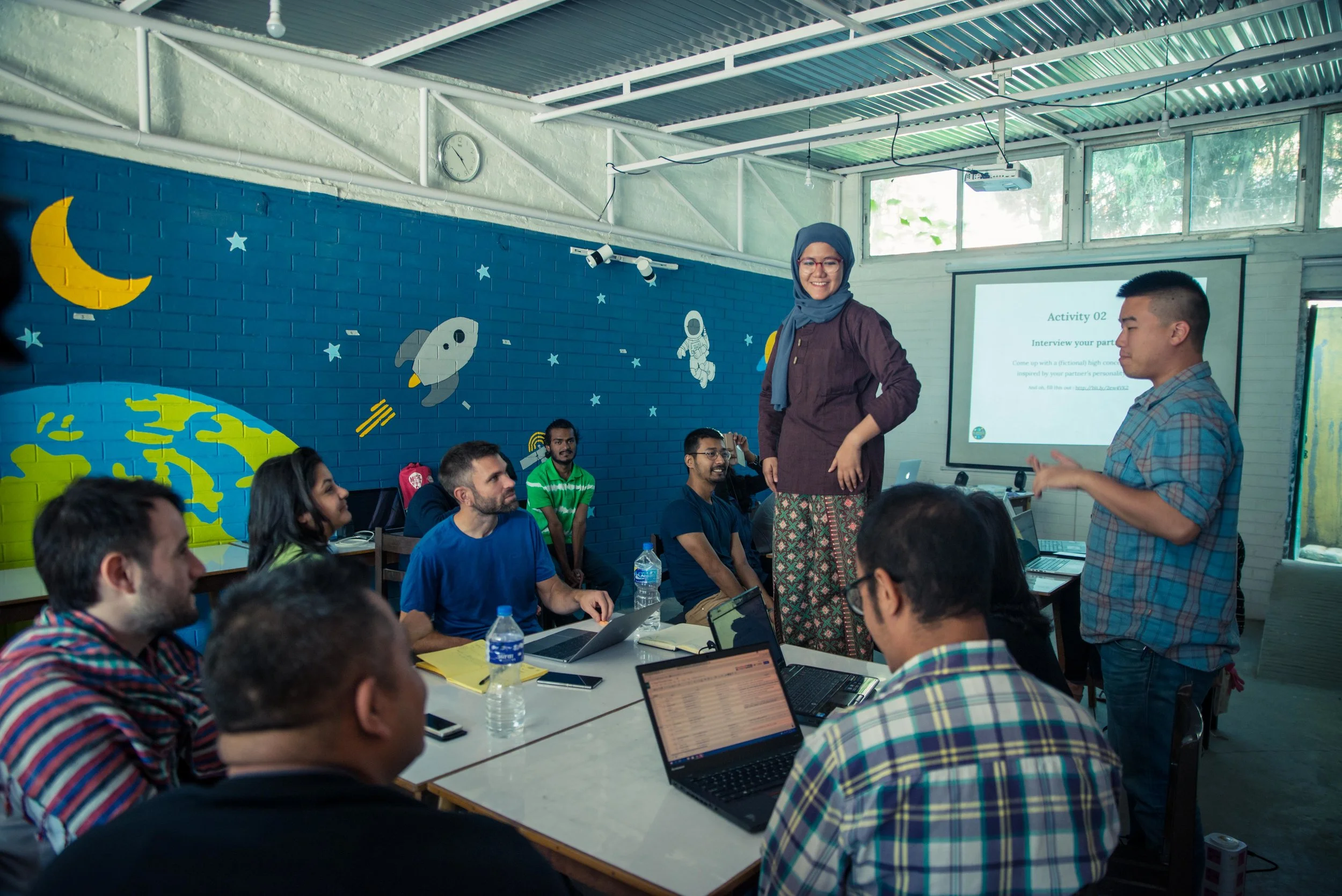 Ayisha Rahman (Malaysia) and Hermes Huang (USA) lead an activity in the Karkhana classroom in Kathmandu, Nepal during K_Space. Photo credit: Karkhana