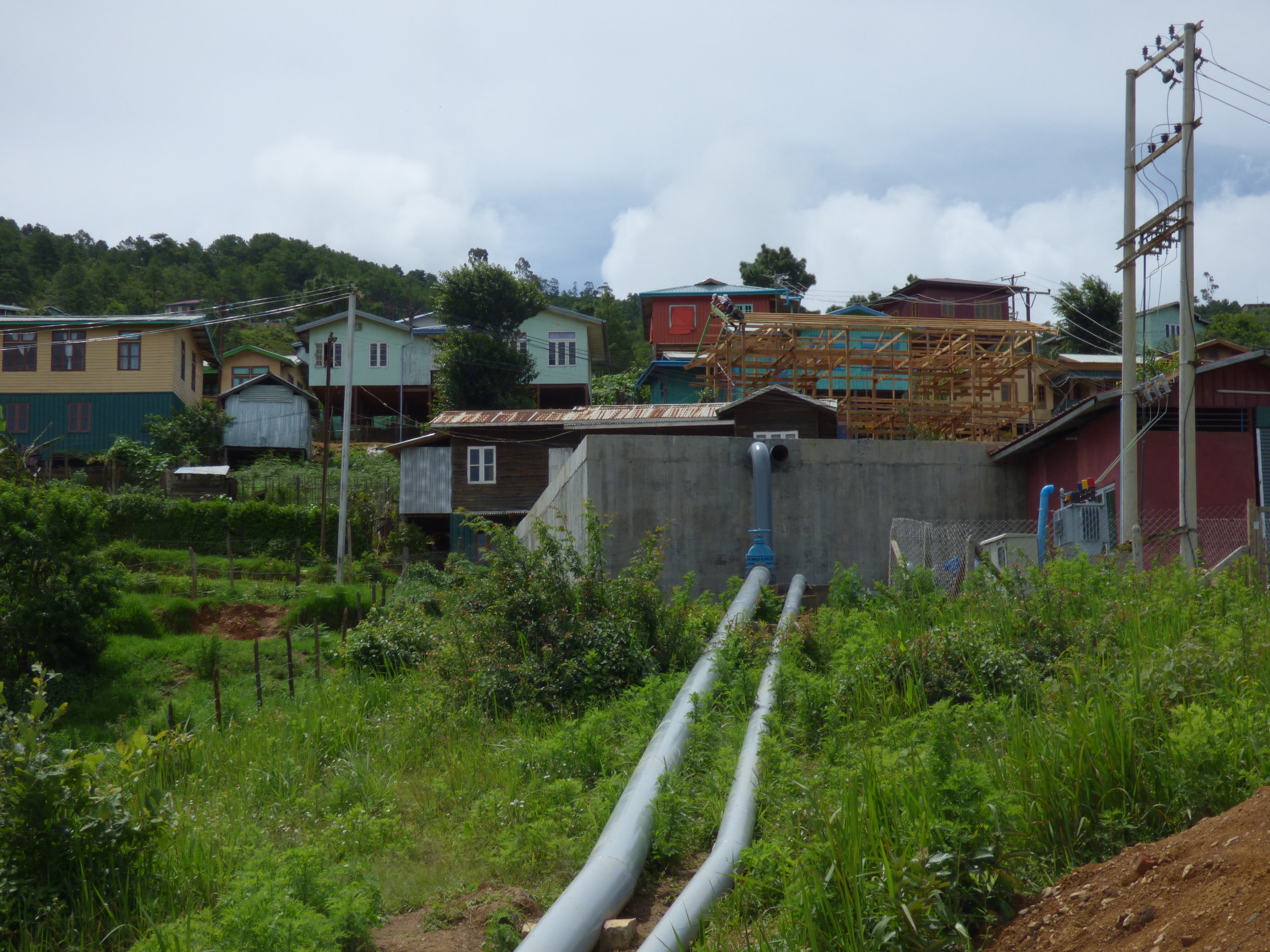 The pipeline and large storage tank that will connect to the Tiket Dam, and deliver municipal water to Hakha once commissioned 