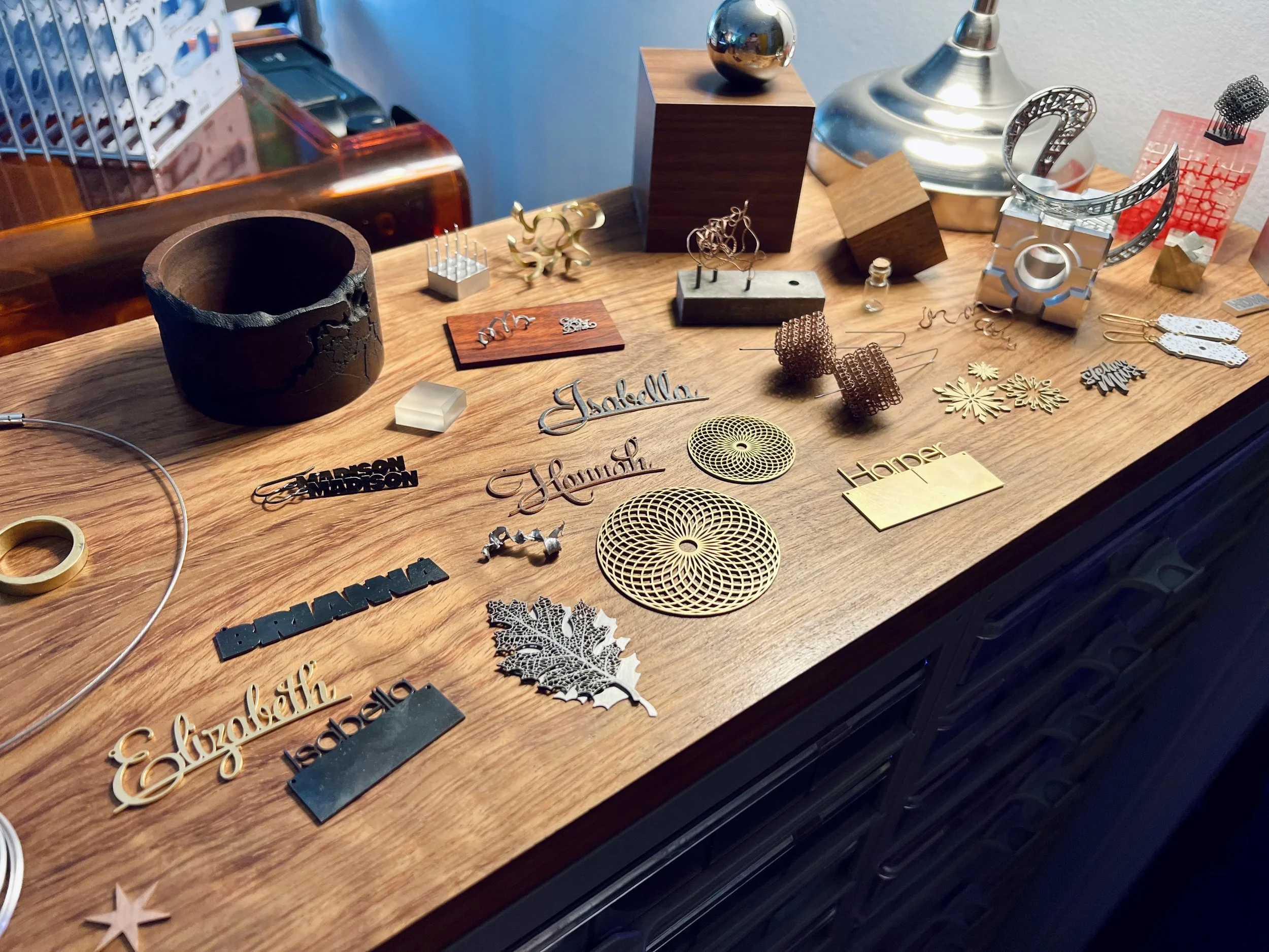  Laser cut objects made from metals exhibit intricate designs that showcase modern manufacturing. The precision of laser cutting creates elaborate patterns, turning materials like stainless steel, aluminum, and brass into elegant sculptures, jewelry,