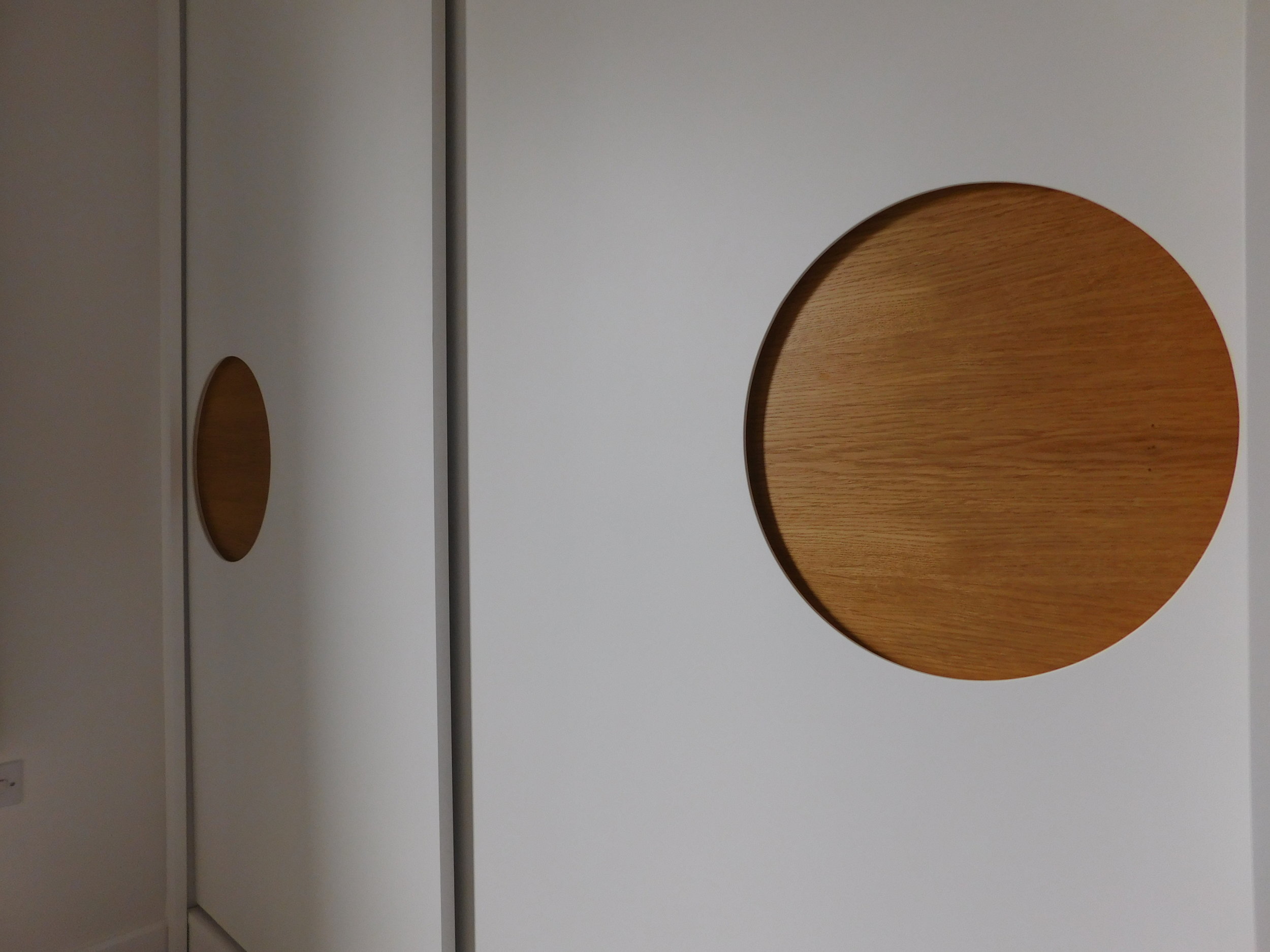 Sliding doors with Oak inset handle panels