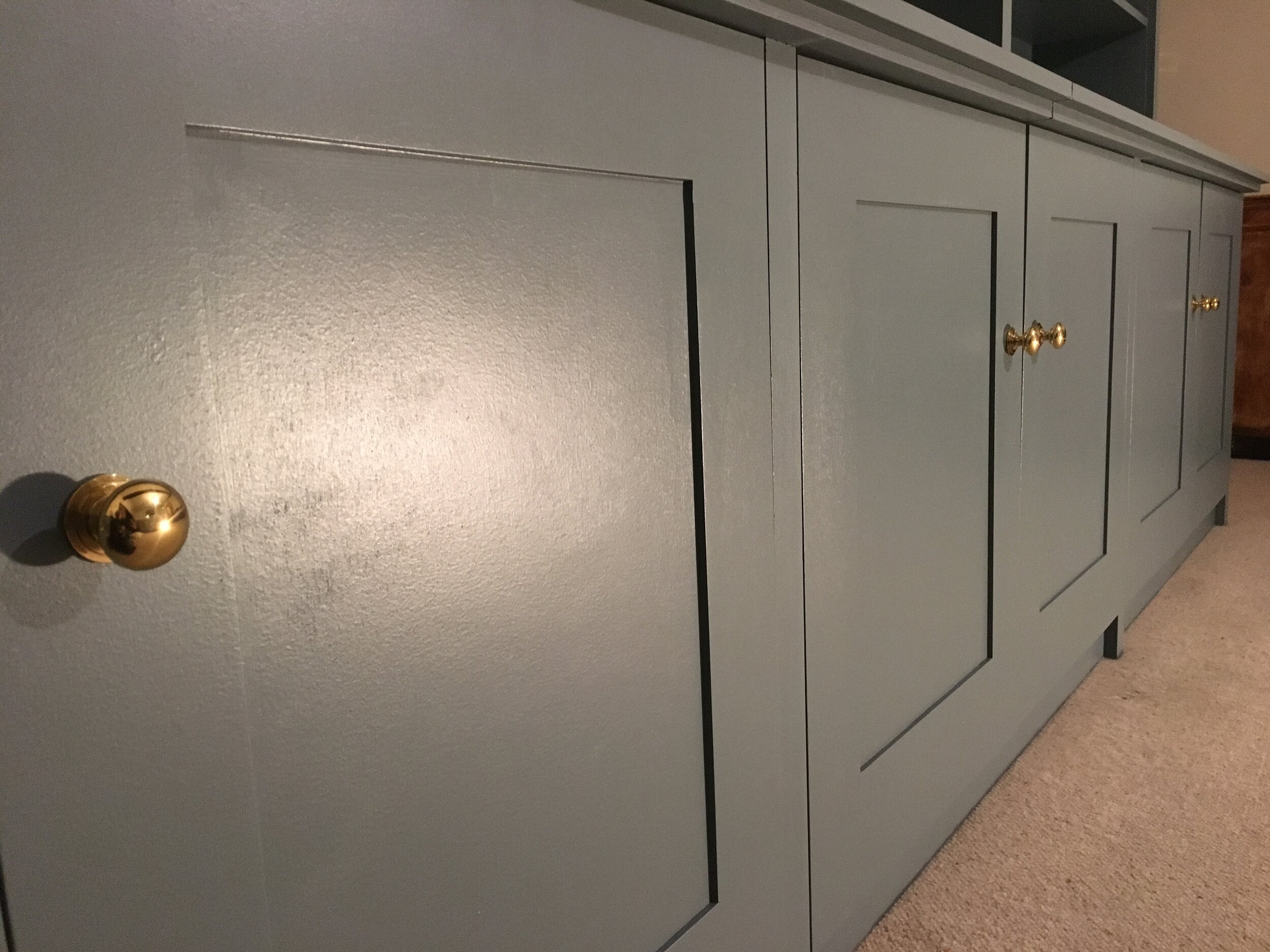 Panel doors with polished solid brass knobs