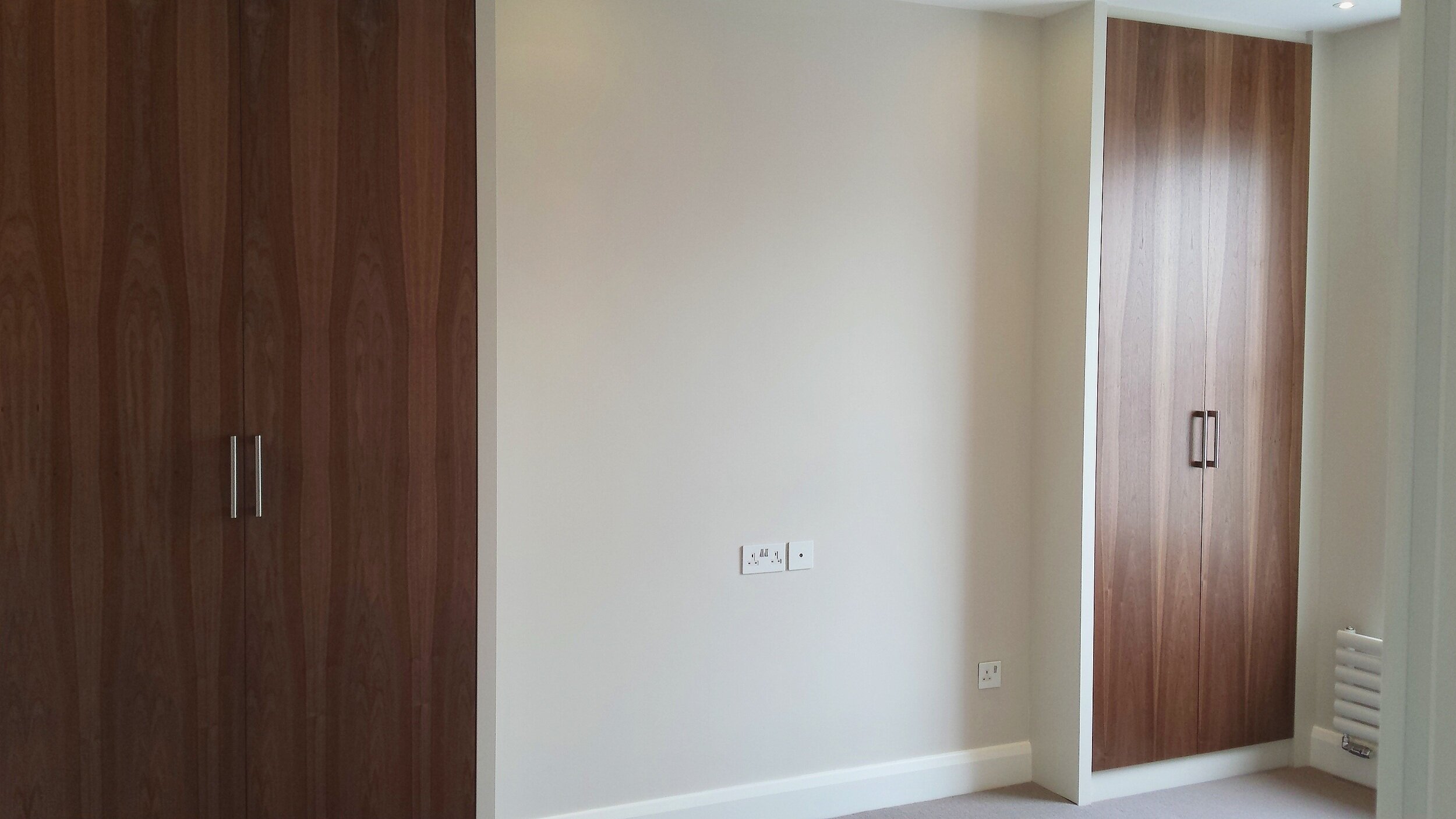 Wardrobes with walnut doors