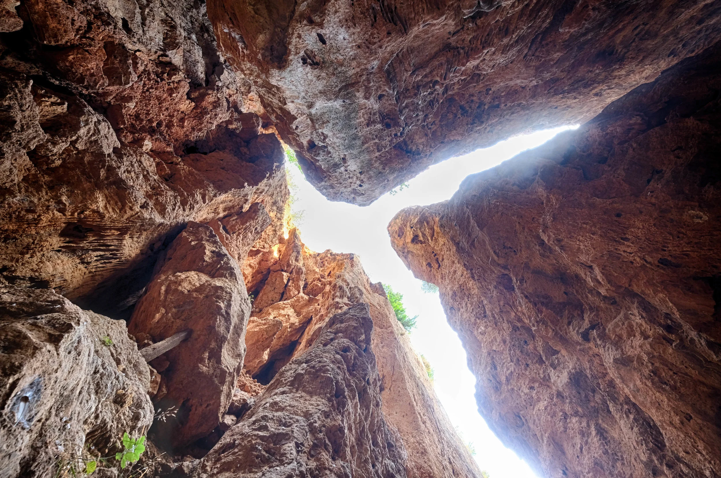 Further down the Ravine, it splits into 4. One path is too dark to climb (probably some weird mutant pigeon bats in there). One is short, but another had more overhangs visible.
