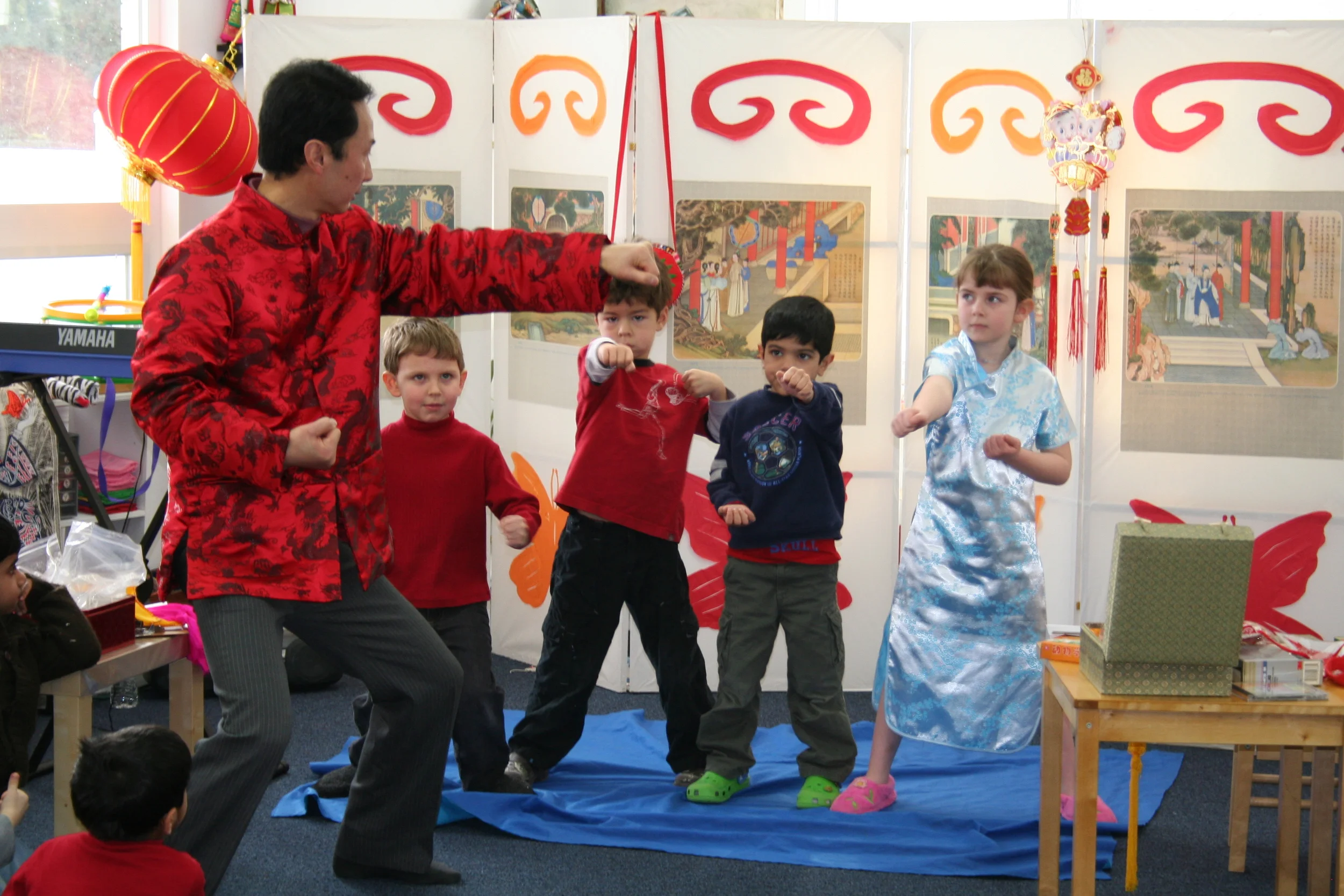 Children taking part in a cultural learning activity at IMS