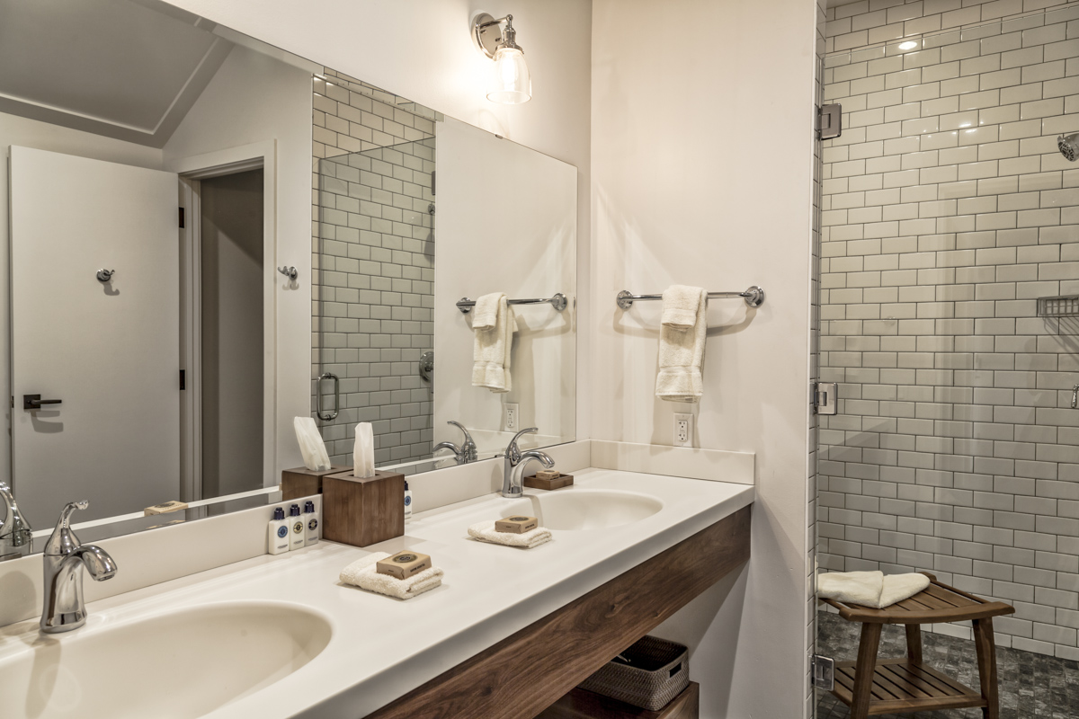 A view of the Double Vanity Sink in the bathroom of the Lodge Single King Rooms