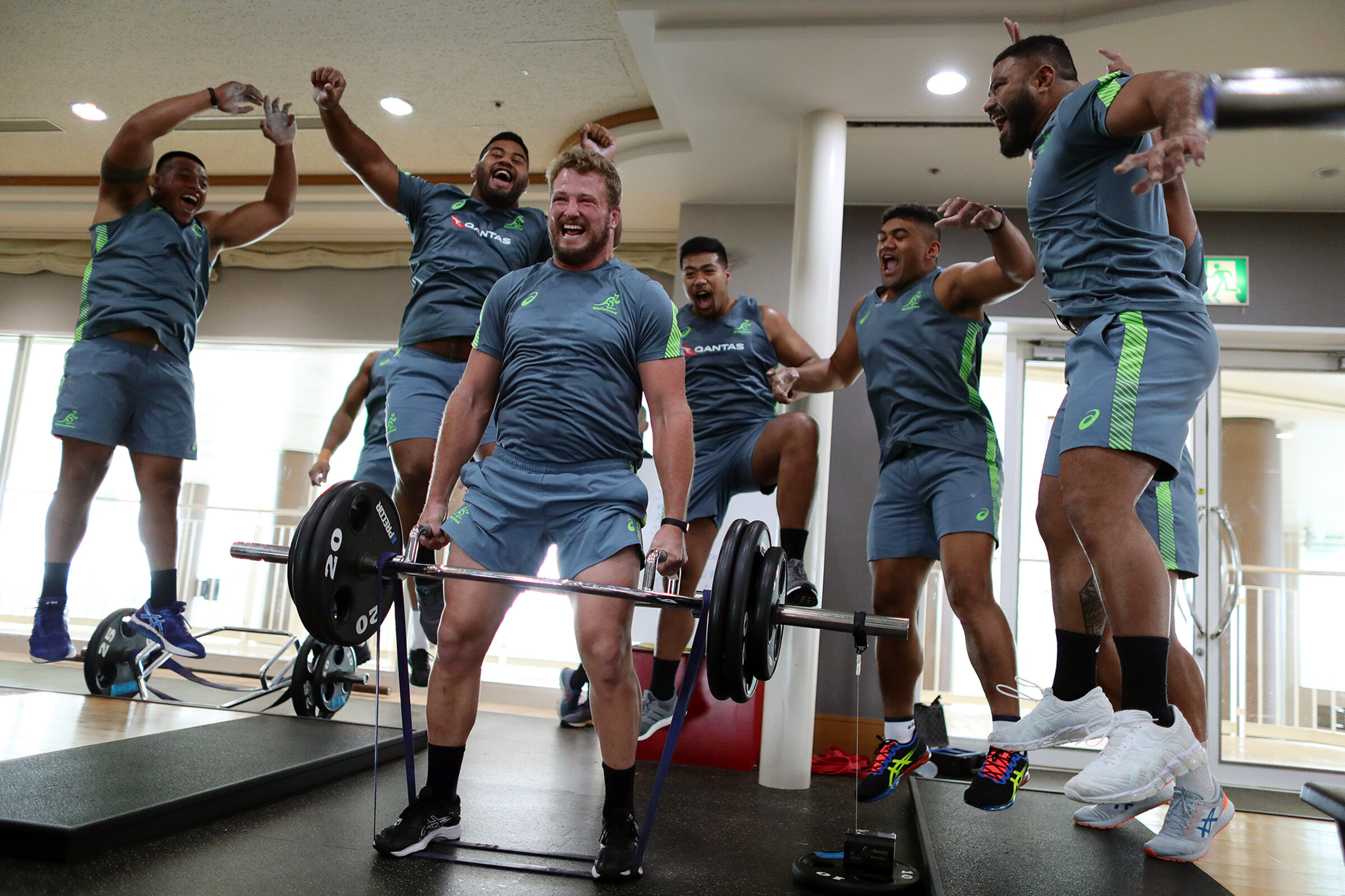  James Slipper receives encouragement from his team mates in the gym. 