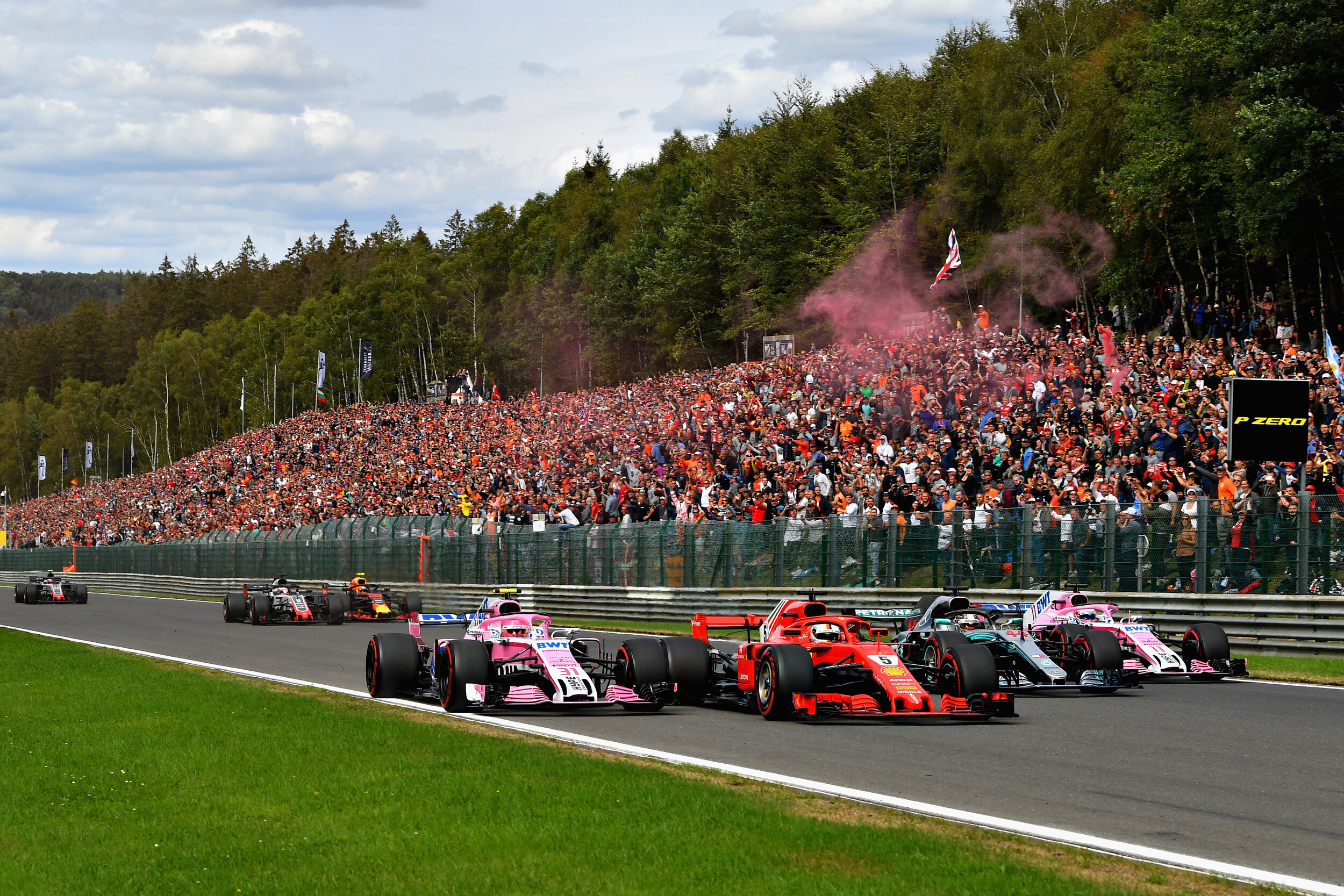  Four wide up the hill in Spa. 