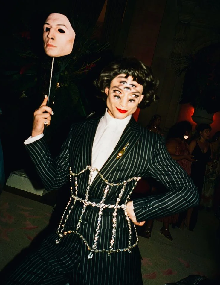 Ezra Miller - also exempt from the black tux rant. In a custom pin-stripped Burberry suit, complete with train, jewel encrusted corset, mask, and 7 eyes, Ezra’s outfit was anything but safe.