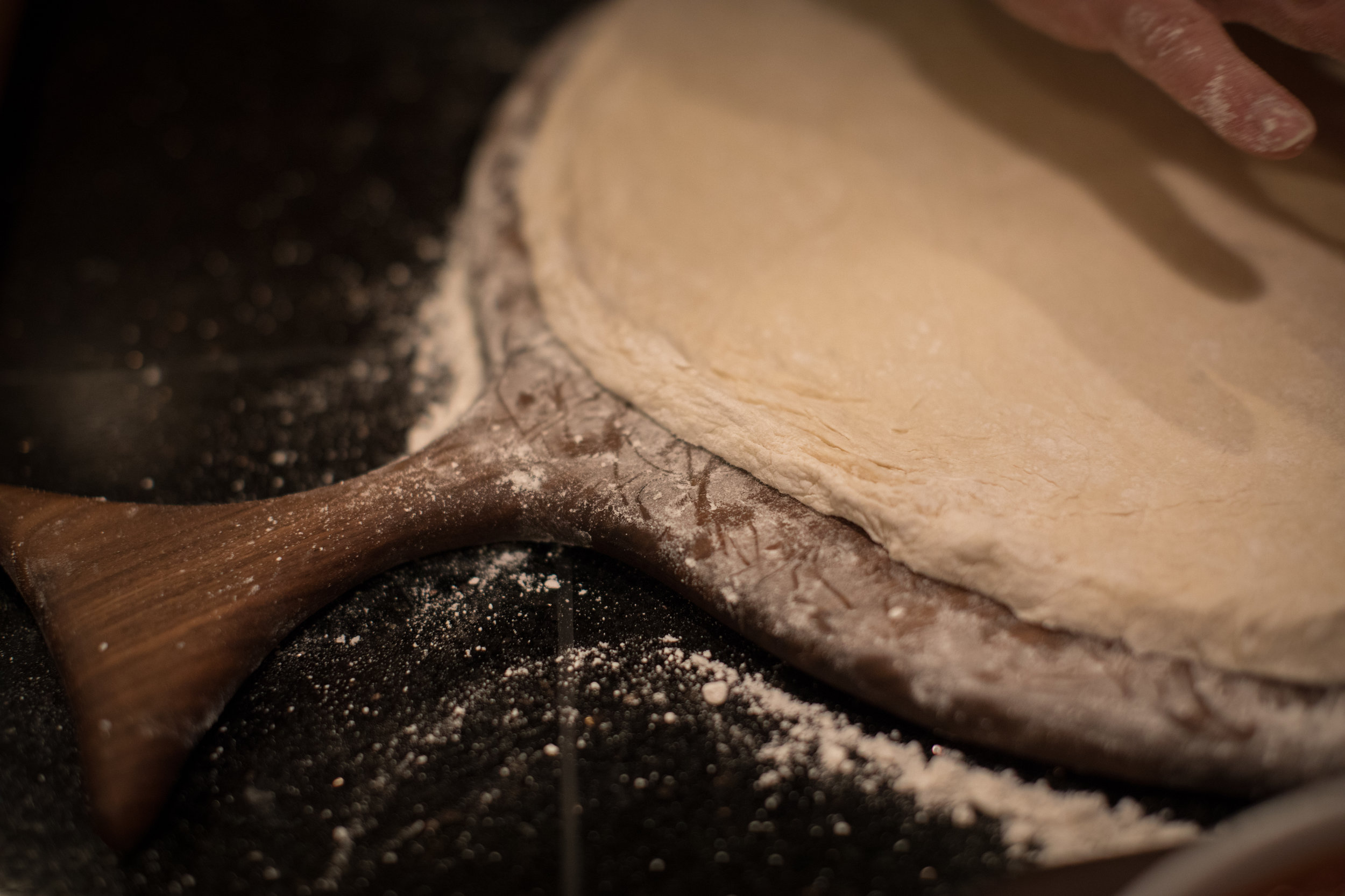 Pizza Board Handle with Rolled Dough and Flour.jpg