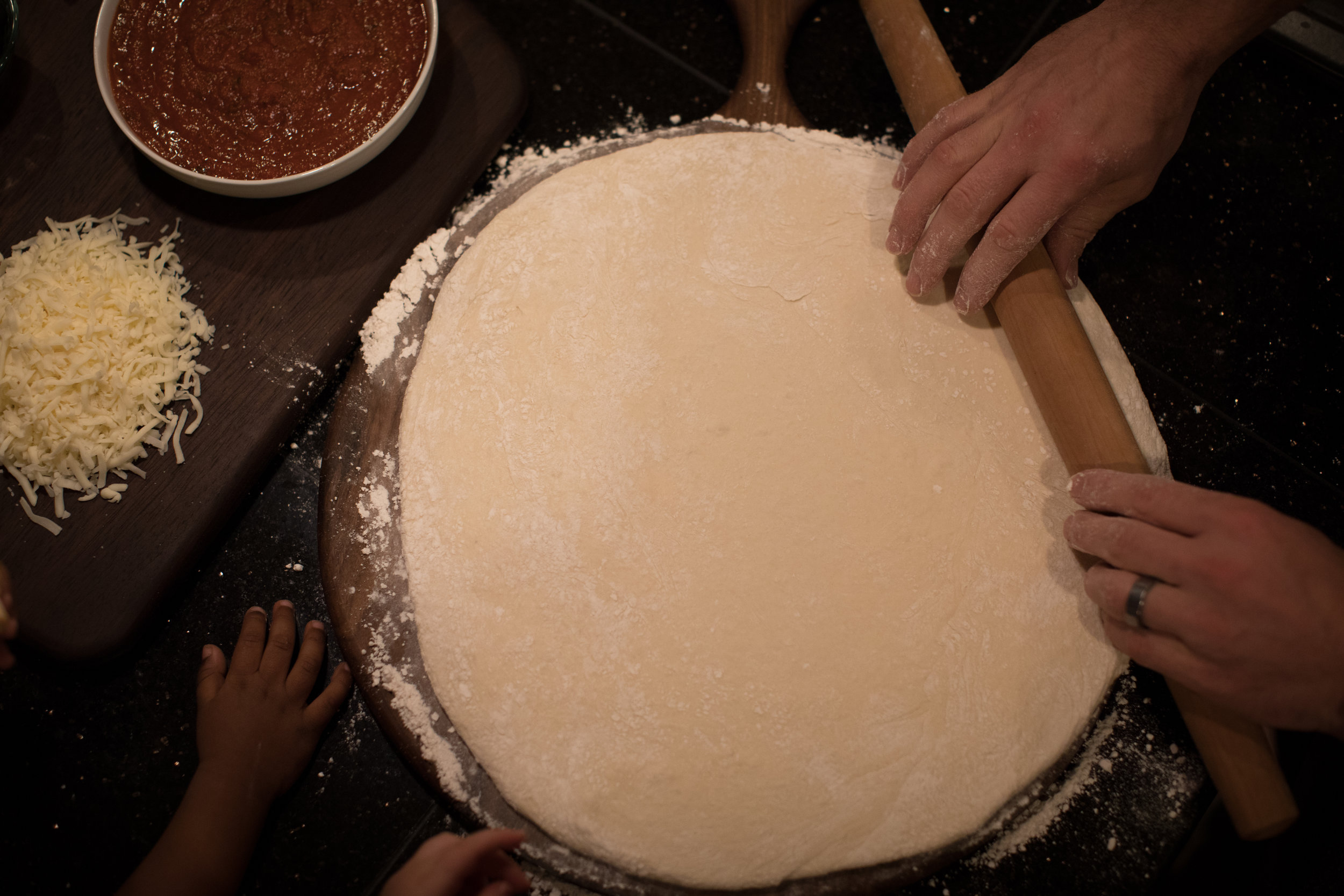 Pizza Board with Rolled Dough and Flour.jpg