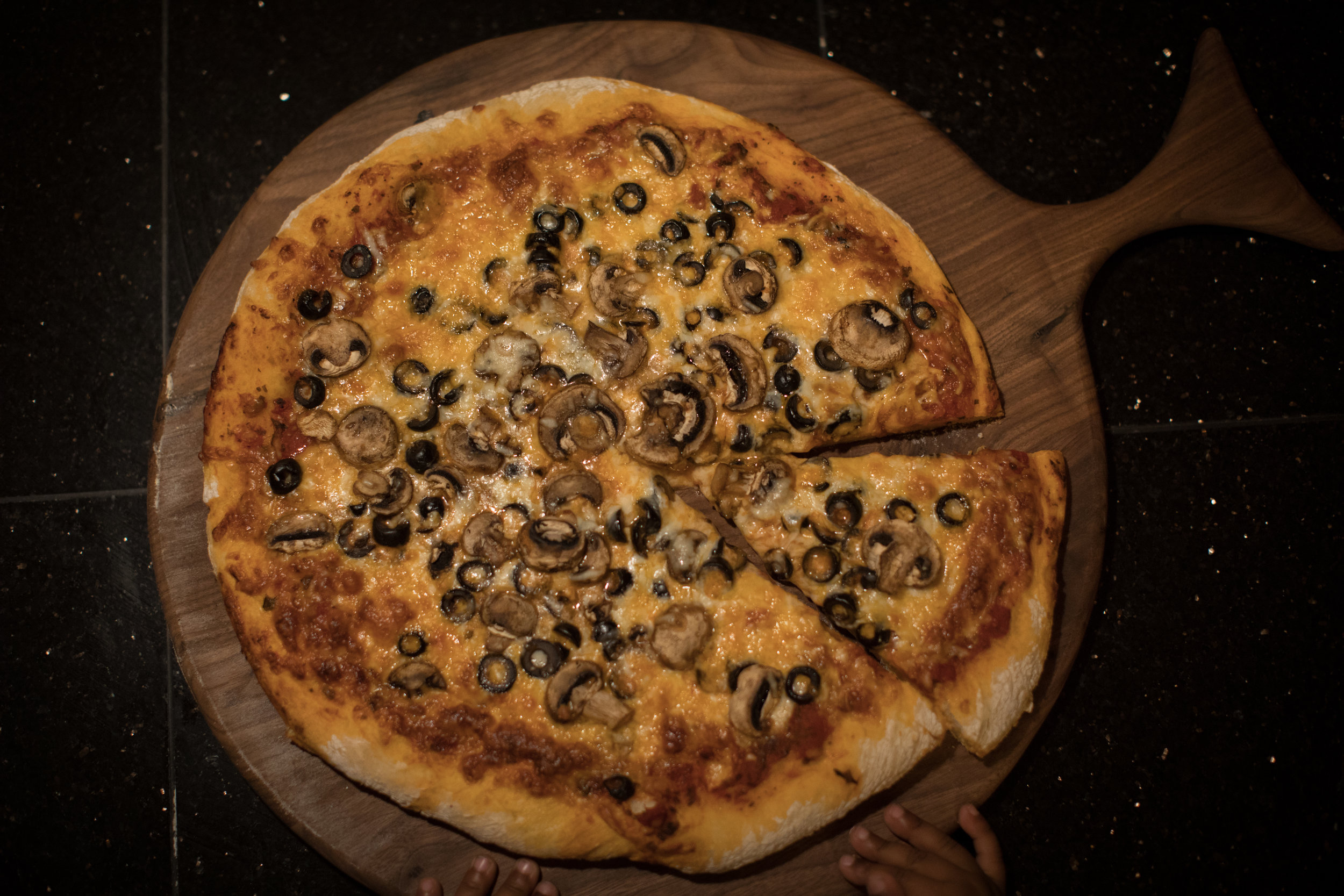 Pizza Board with Cooked Pizza and Slize Cut Out.jpg