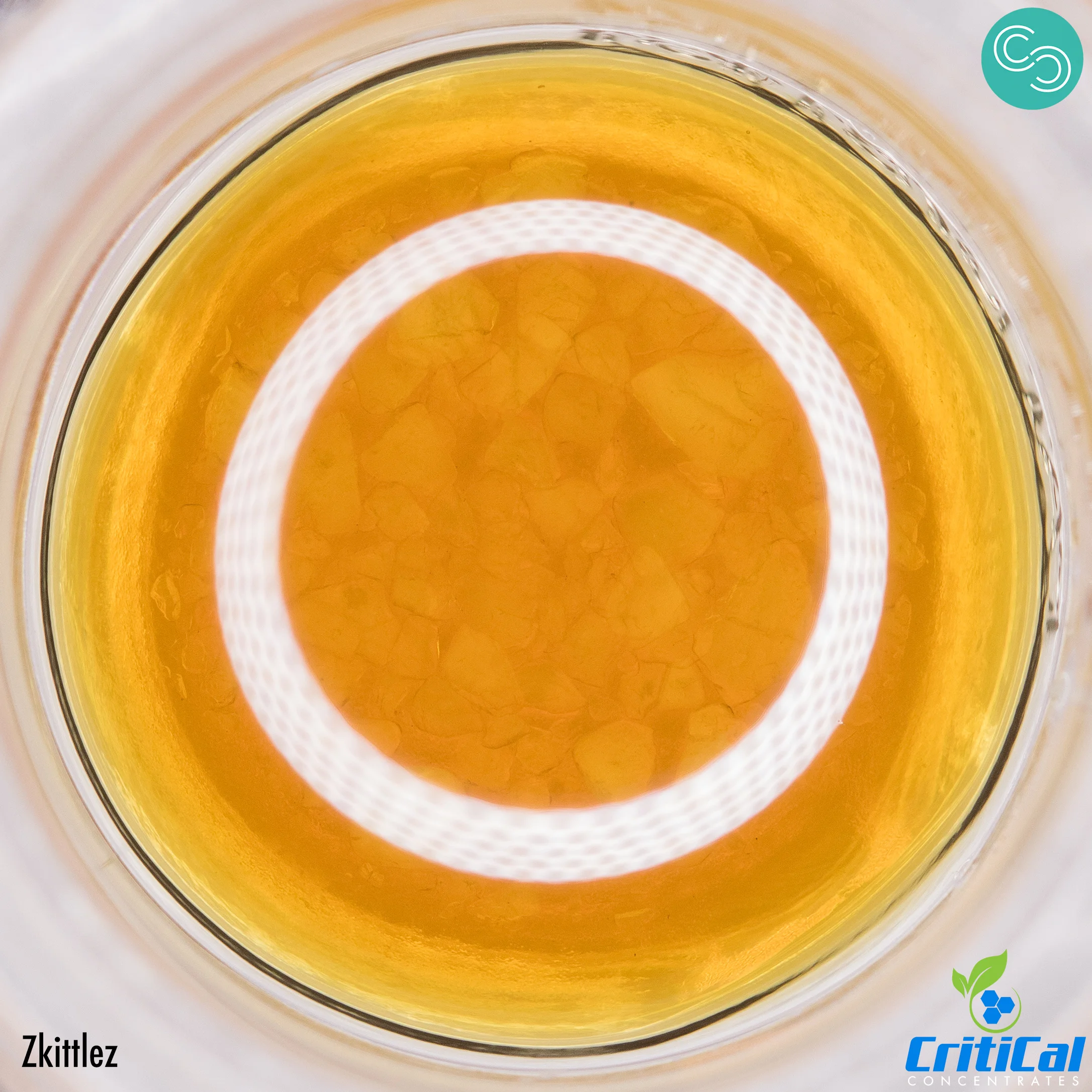 Zkittlez sauce grown by Terp Hogz and extracted by Critical Concentrates. Classic orange windex terpene profile and deep muscle relaxing effect.