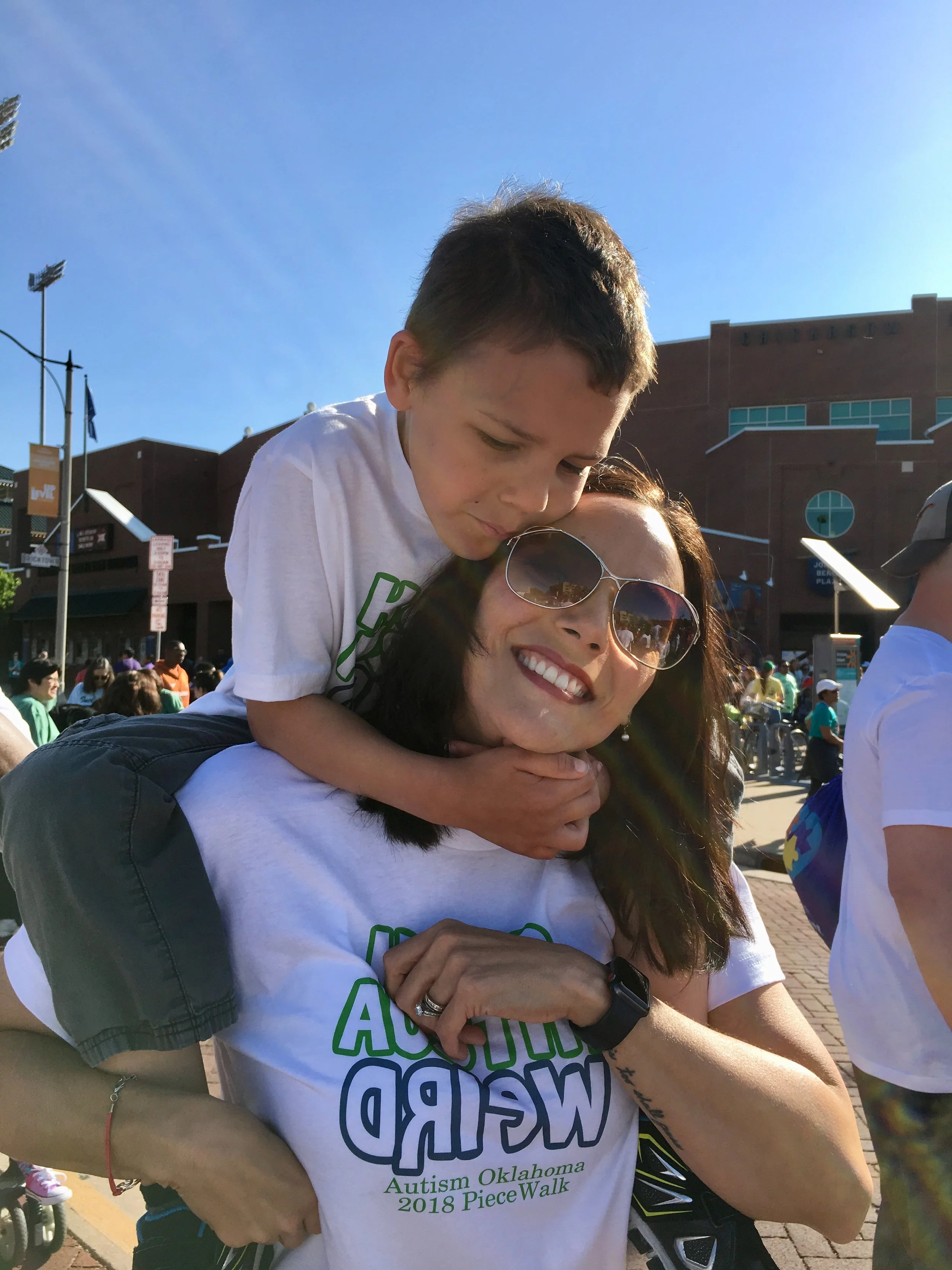 Austin's brother loving on his mommy.