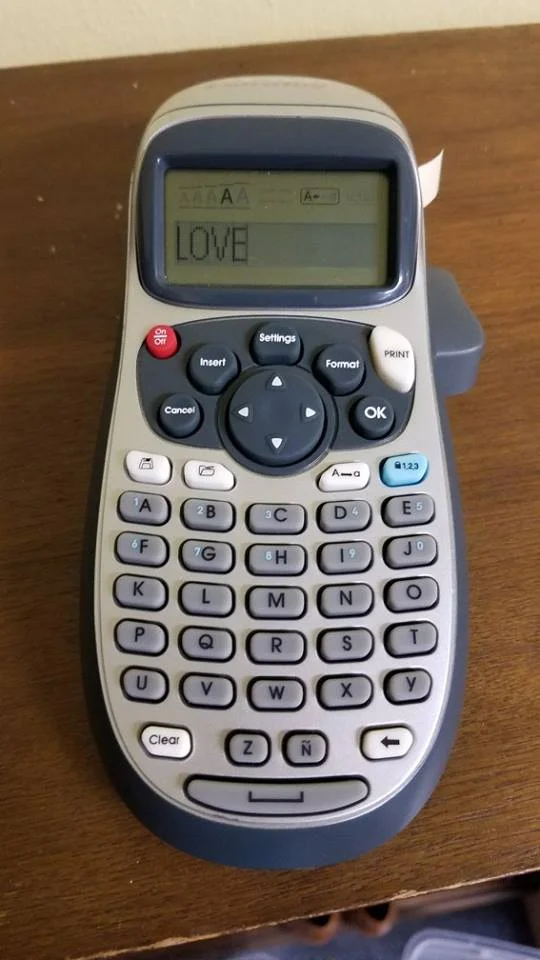 This was the word on the Lottie House label maker when Adam turned it on! Can't make up this stuff!