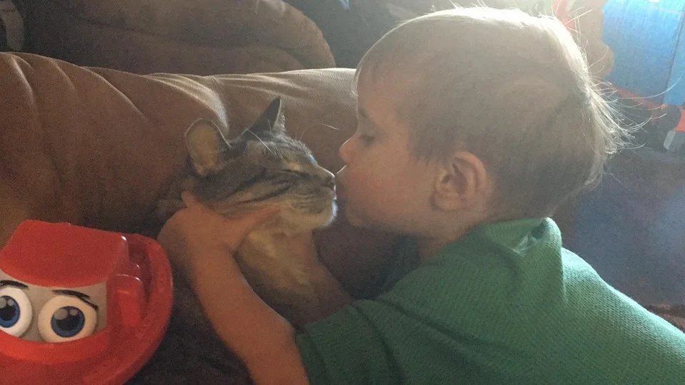 Caleb and his rescue kitty, Smudge