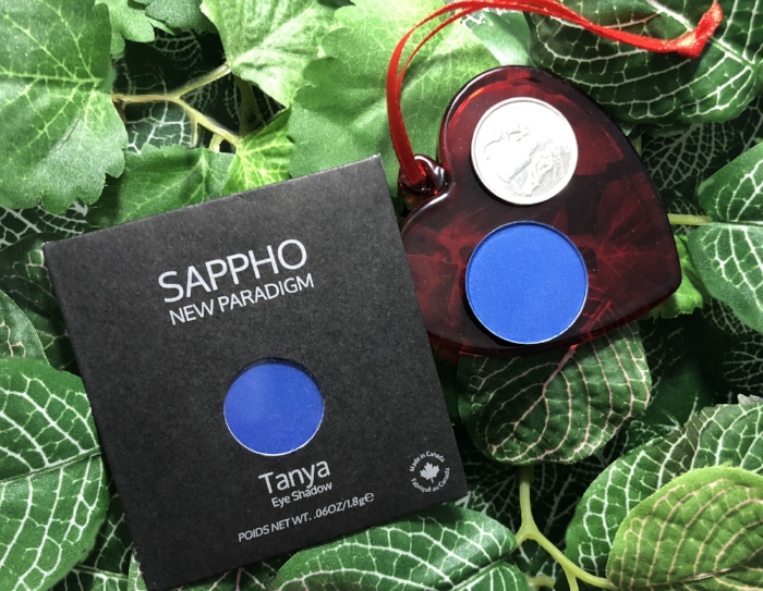 The Canadian Quarter shown above is identical in size to a U.S. Quarter, thus it is easy to discern that Sappho New Paradigm Eyeshadows provide a good-sized pop of color for your palette.