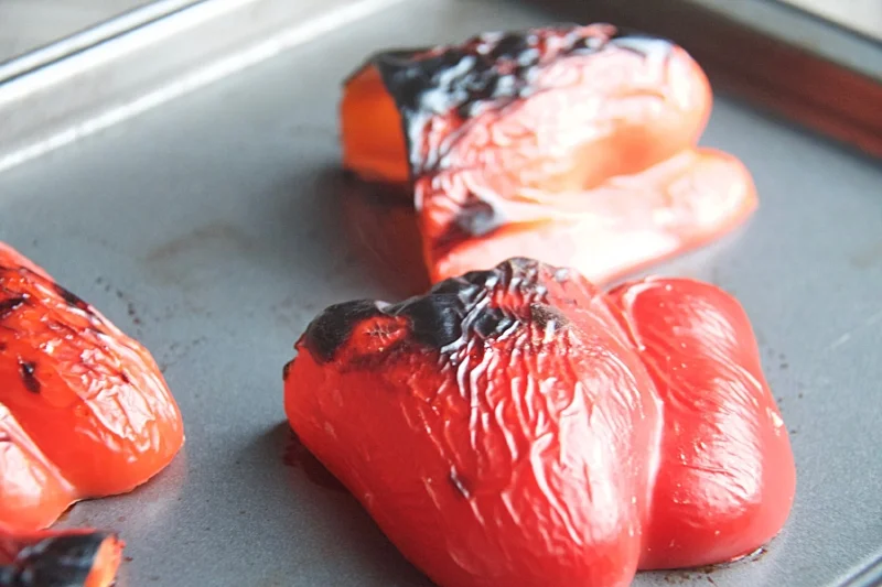 When the bell peppers have been charred, this is what their skin will look like!