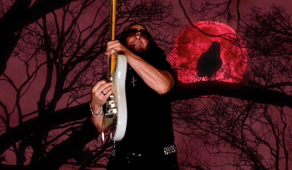 John Seda the artist performs Evil Ways.jpg