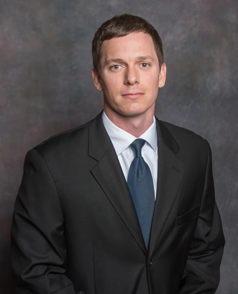Eric J. Carmichael - Attorney