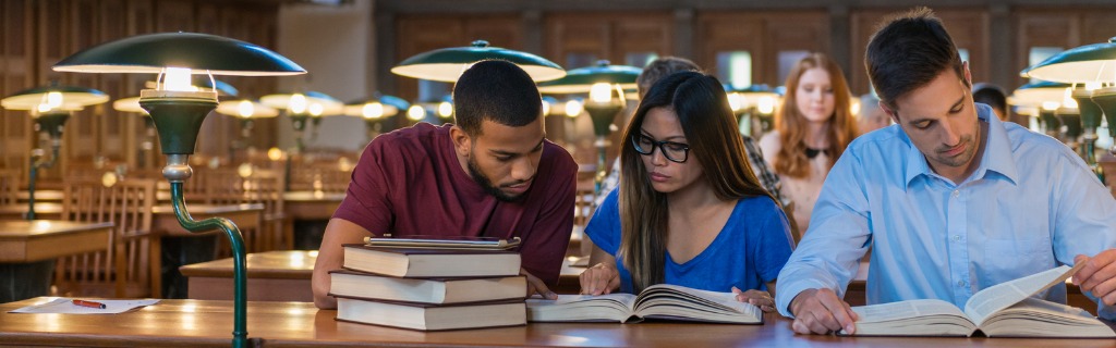 multi-ethnic-students-studying-in-a-library-picture-id876865594.jpg