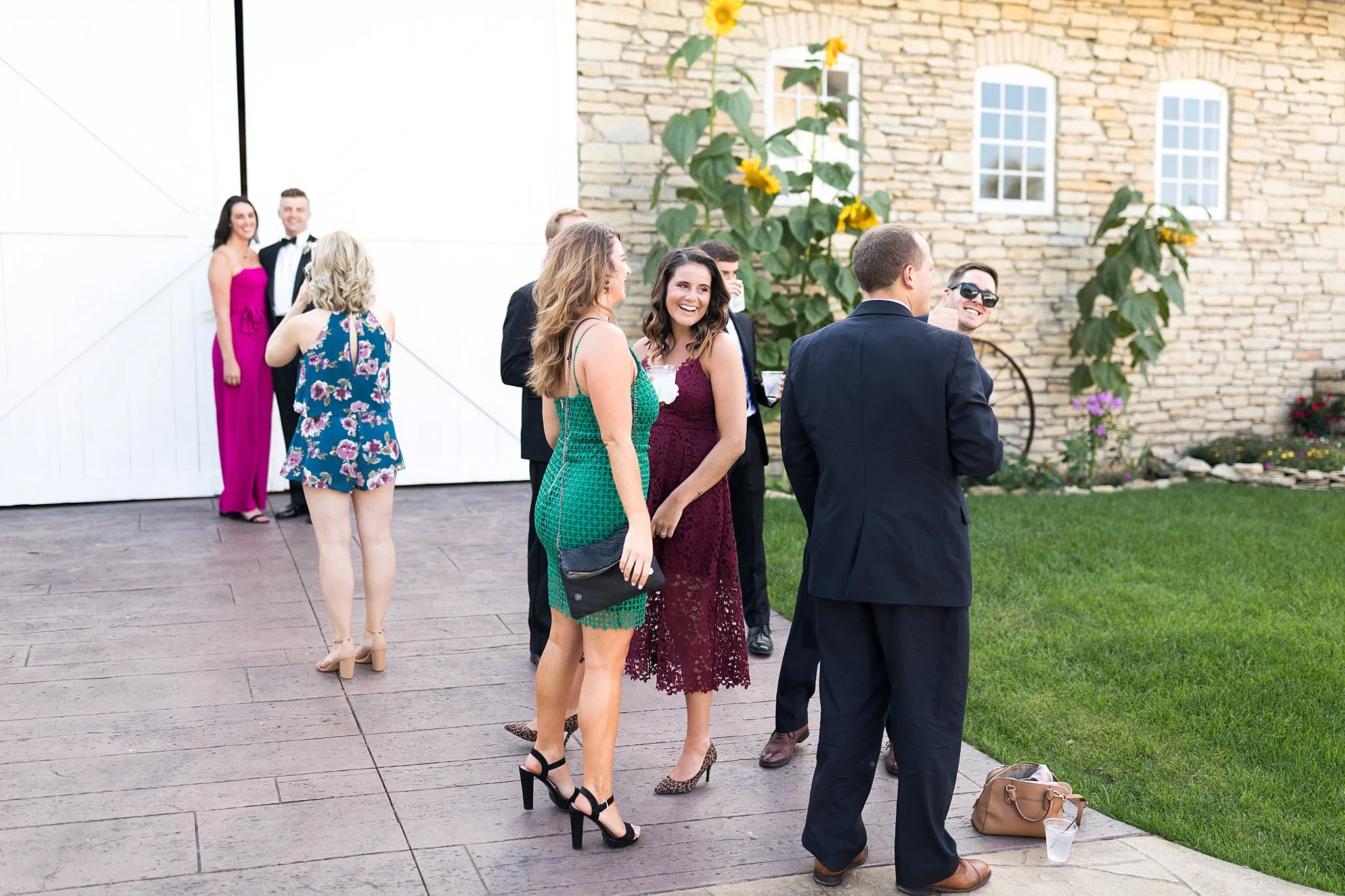 Mayowood Stone Barn wedding guests enjoying cocktail hour 1 of 10.