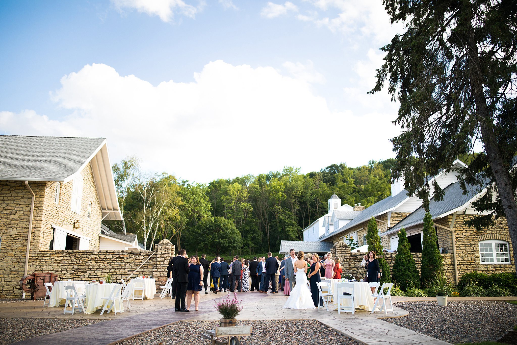  Mayowood Stone Barn wedding guests enjoying cocktail hour 10 of 10. 